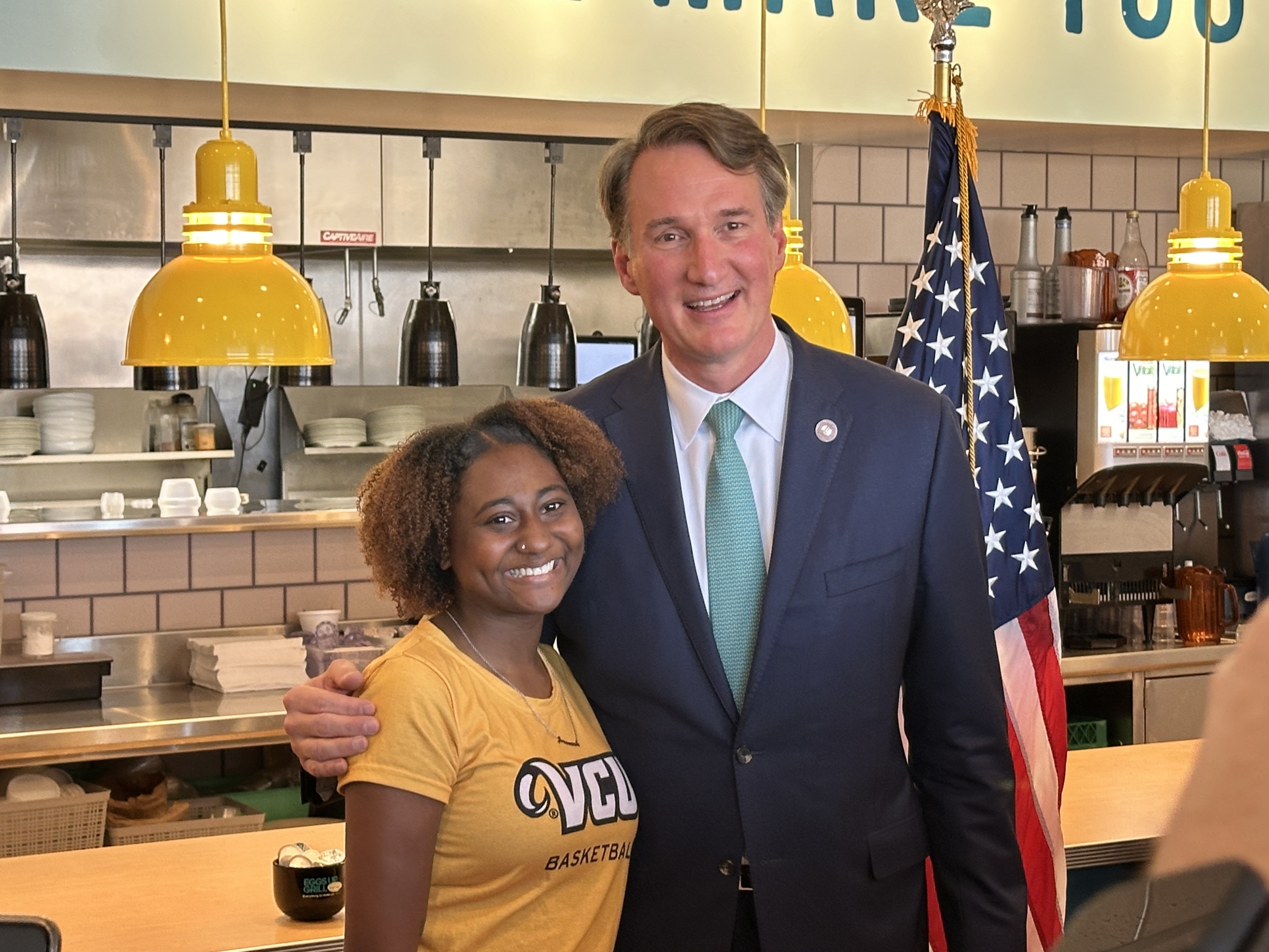 Nyla Harris with Gov. Glenn Youngkin. Photo by Markus Schmidt.