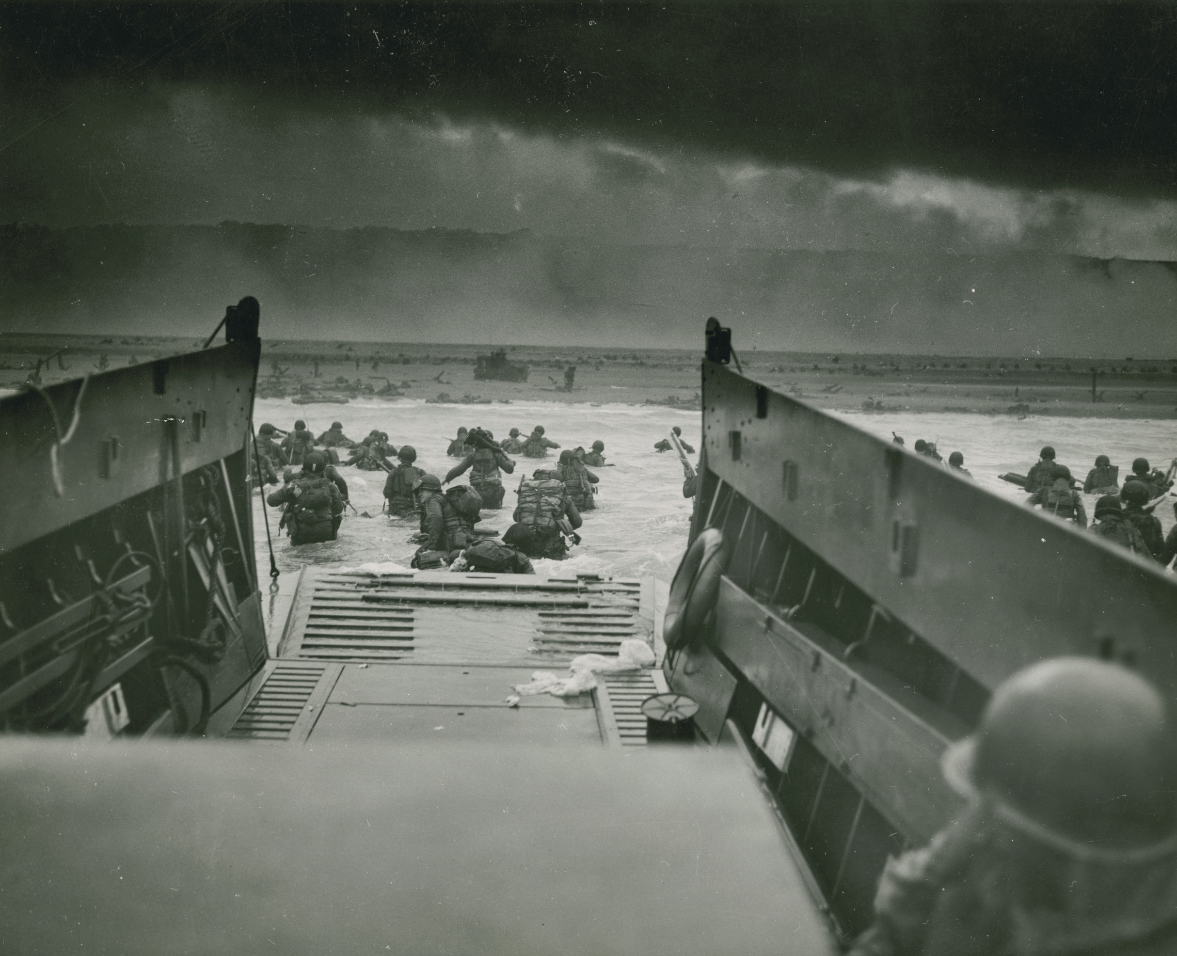 American troops begin their assault on Omaha Beach on June 6, 1944. Courtesy of National Archives and the National World War 2 Museum.