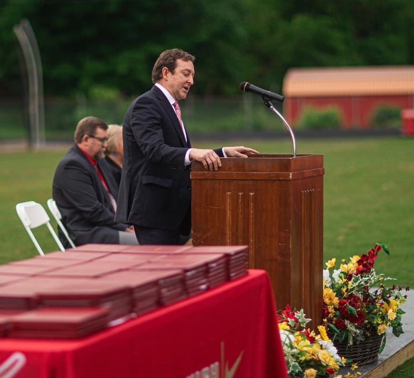 State Sen. Todd Pillion delivers graduation remarks in Lee County. Courtesy of Pillion.