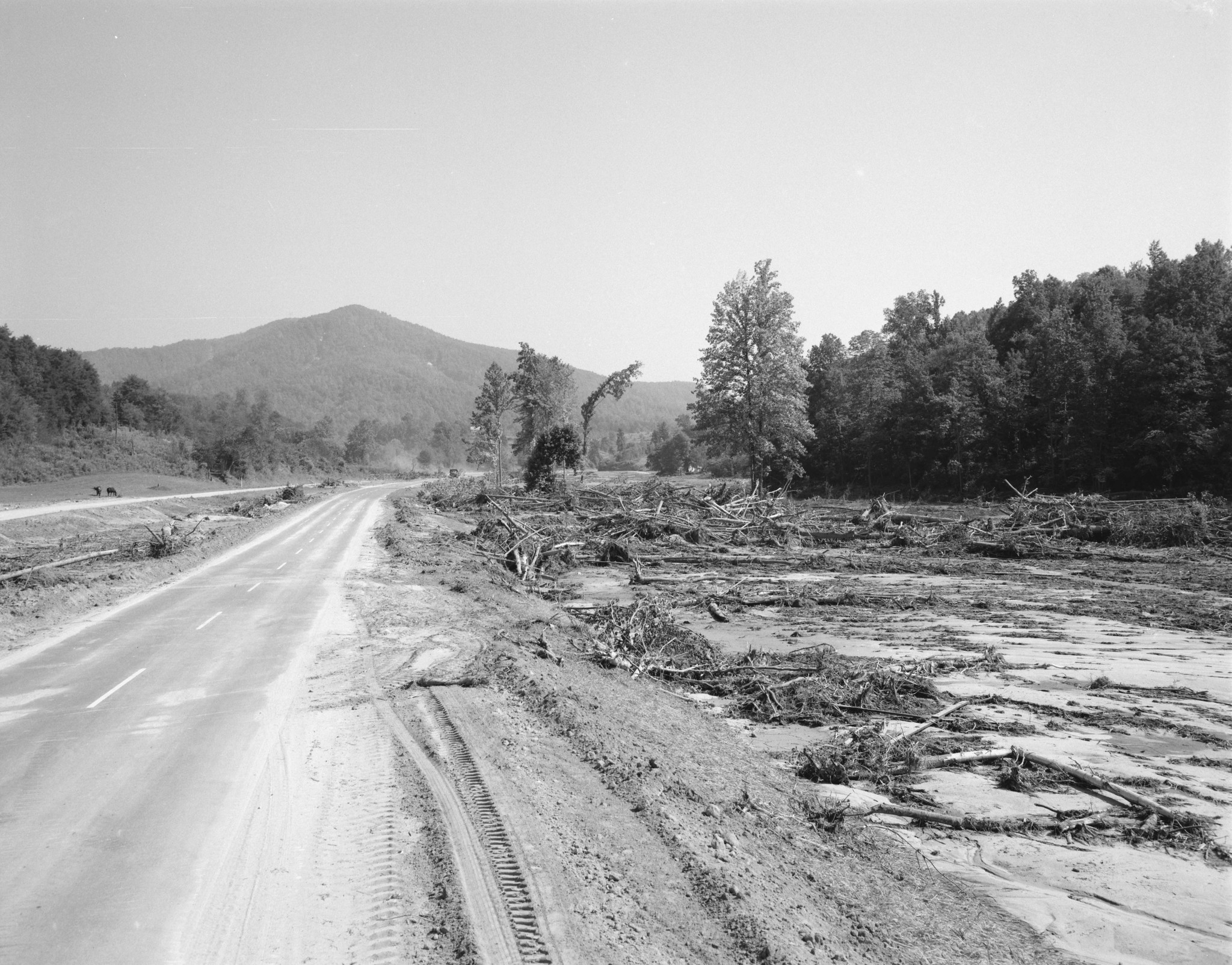 Debris lingers along U.S. 29 in Nelson County following the flooding caused by remnants of Hurricane Camille in 1969. Courtesy of Library of Virginia.
