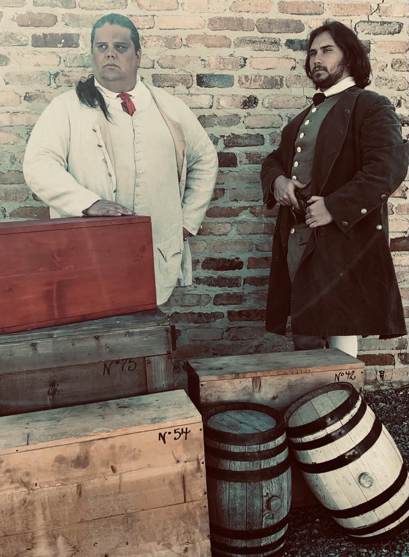Reactors portray William Capps and his colleague Mr. McGeorge, who merchants who chafe under British taxation. Courtesy of Scott County Tourism.
