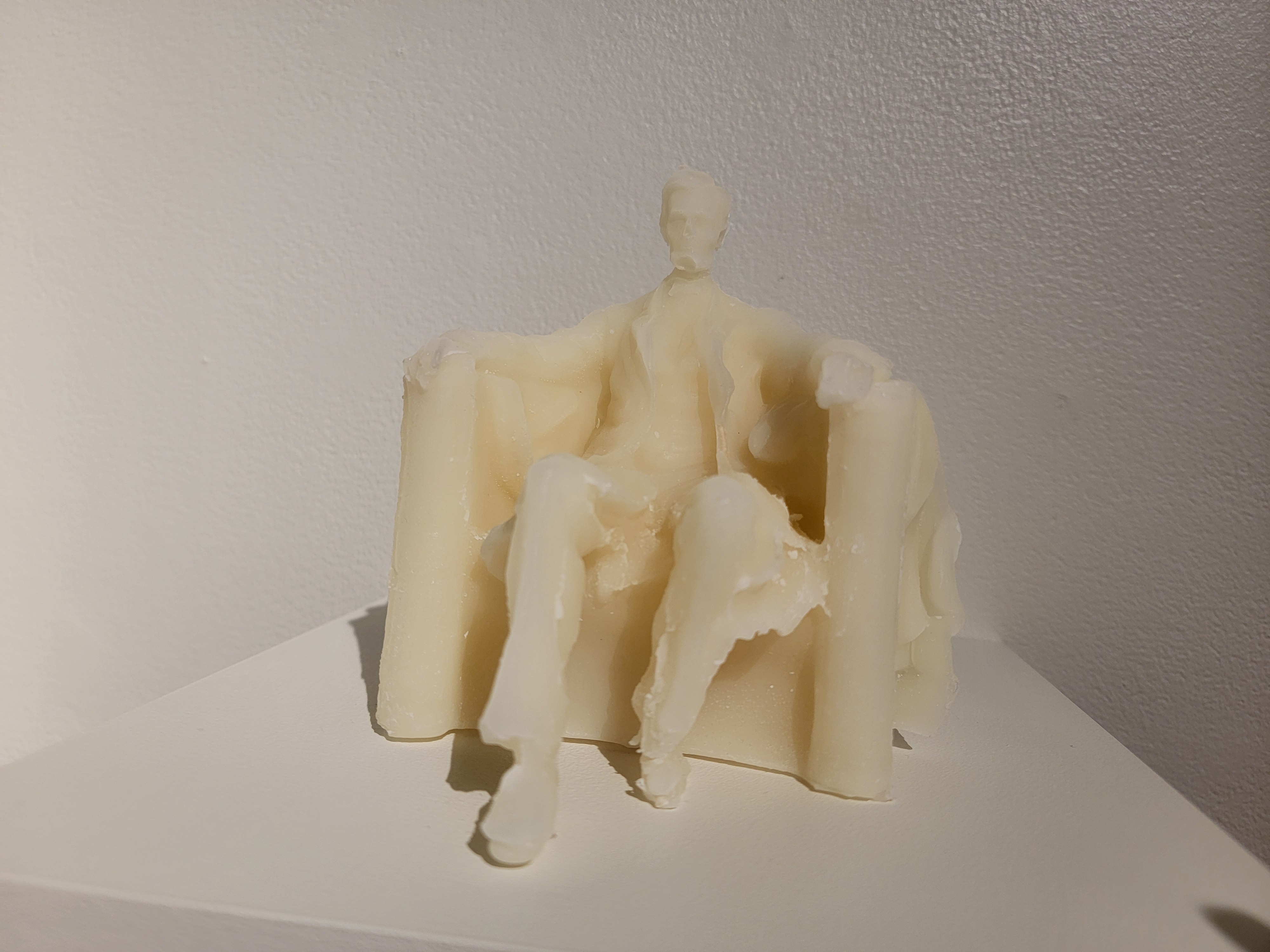Sandy Williams IV's Abe Lincoln wax statue replica on display in the Olin Gallery on campus. Photo by Kate Flannigan. 