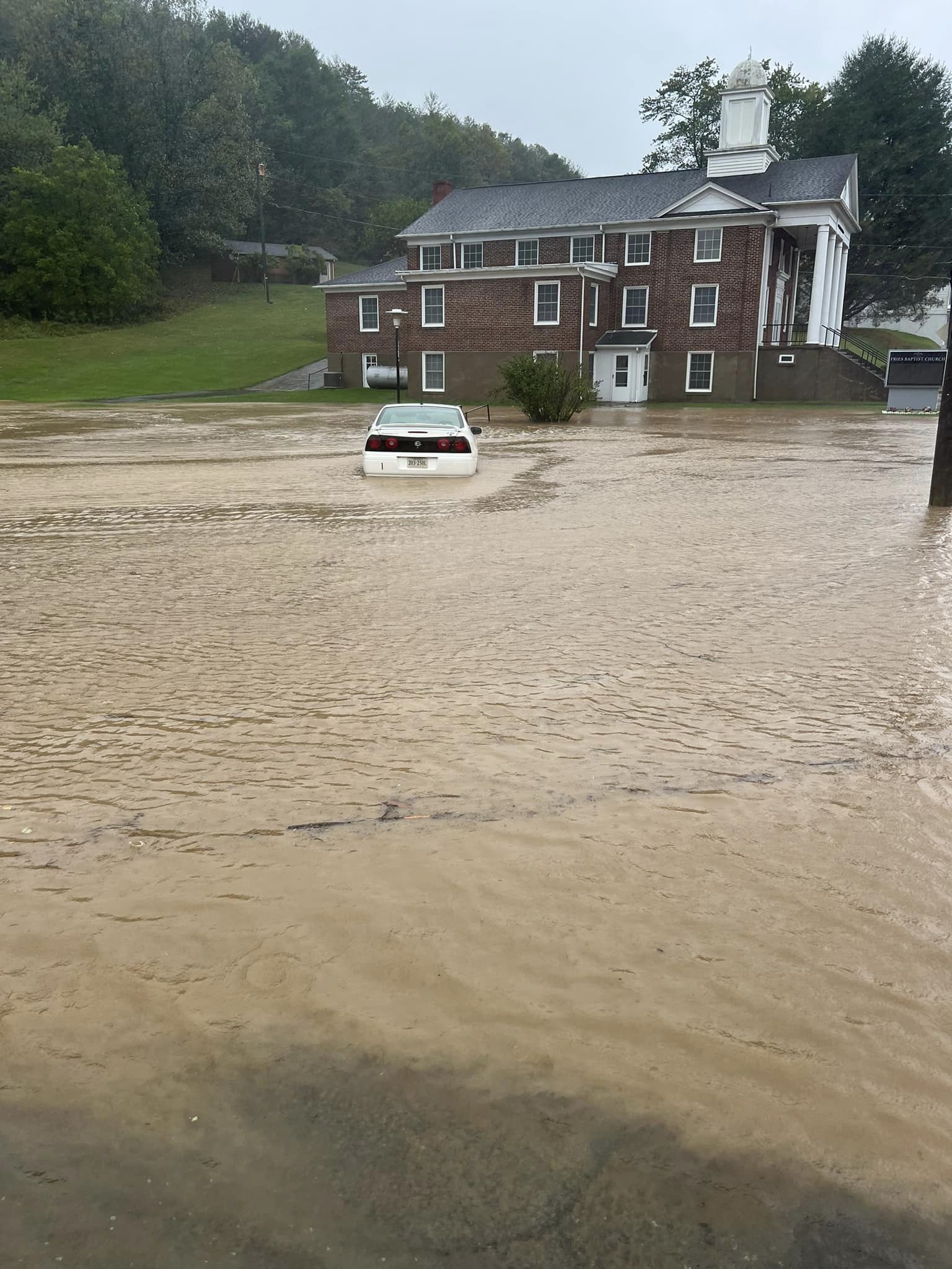 Flooding swamps part of the town of Fries on Friday. Courtesy of Grayson County Sheriff's Office.