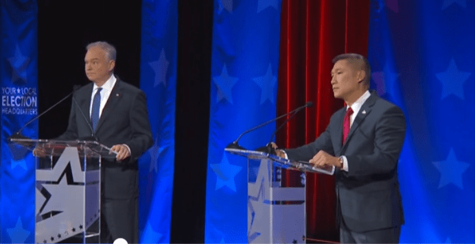 Sen. Tim Kaine, left, and Republican challenger Hung Cao debate in Norfolk. Screenshot.