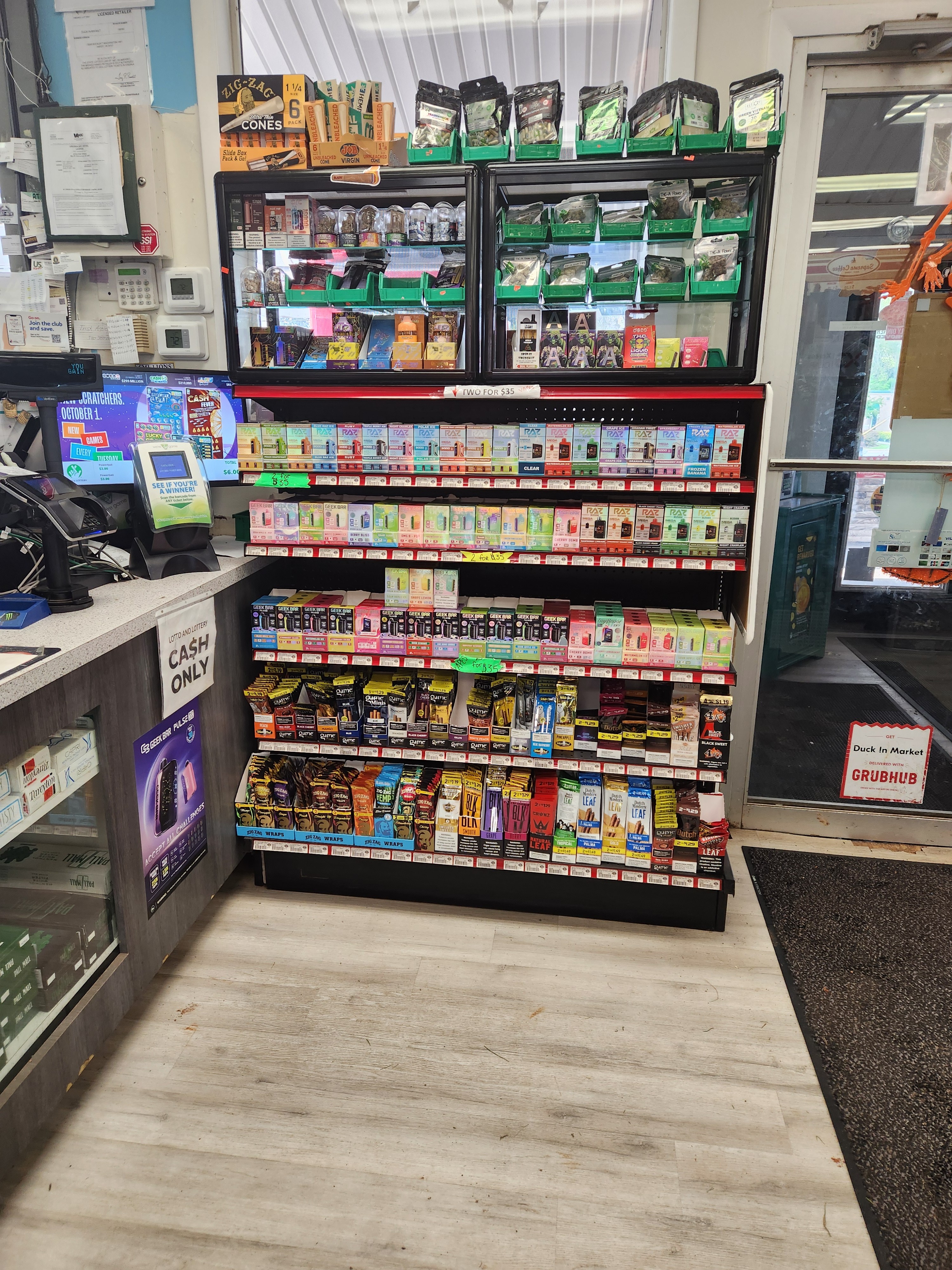 The store display is in front of the counter. The door is at right. The green boxes at top right contain the Life Healing Hemp products. Photo by Dwayne Yancey