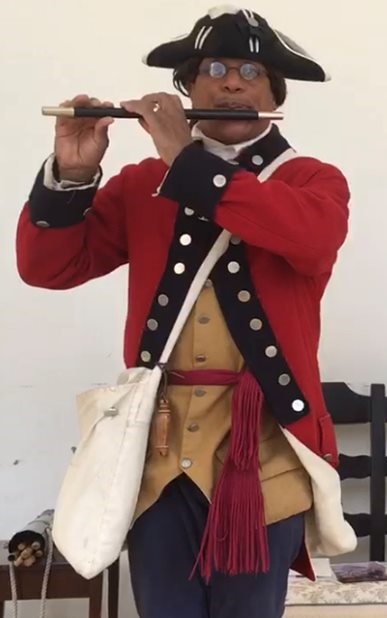 CAPTION: Don Francisco, resident fifer at Mount Vernon. Musicians’ uniform colors were reversed from riflemen’s to aid in battlefield identification; musicians were considered noncombatants, Francisco said. Courtesy photo.