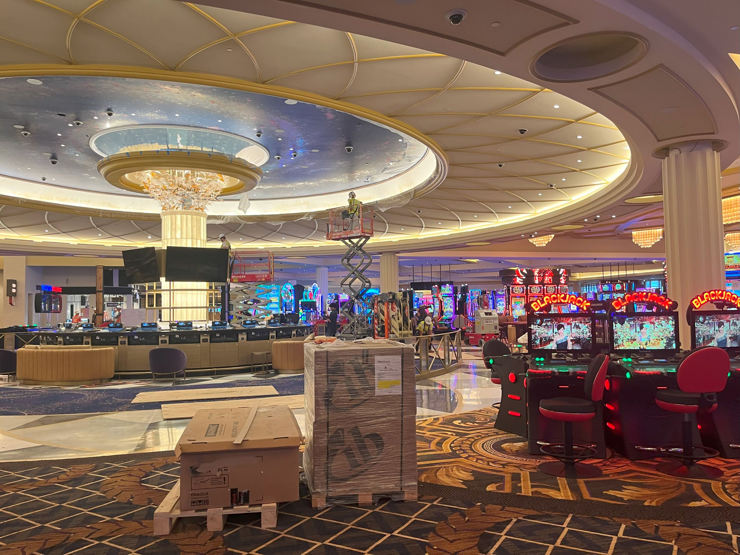 cardboard boxes sit in the middle of the Caesars Virginia casino resort gaming floor.