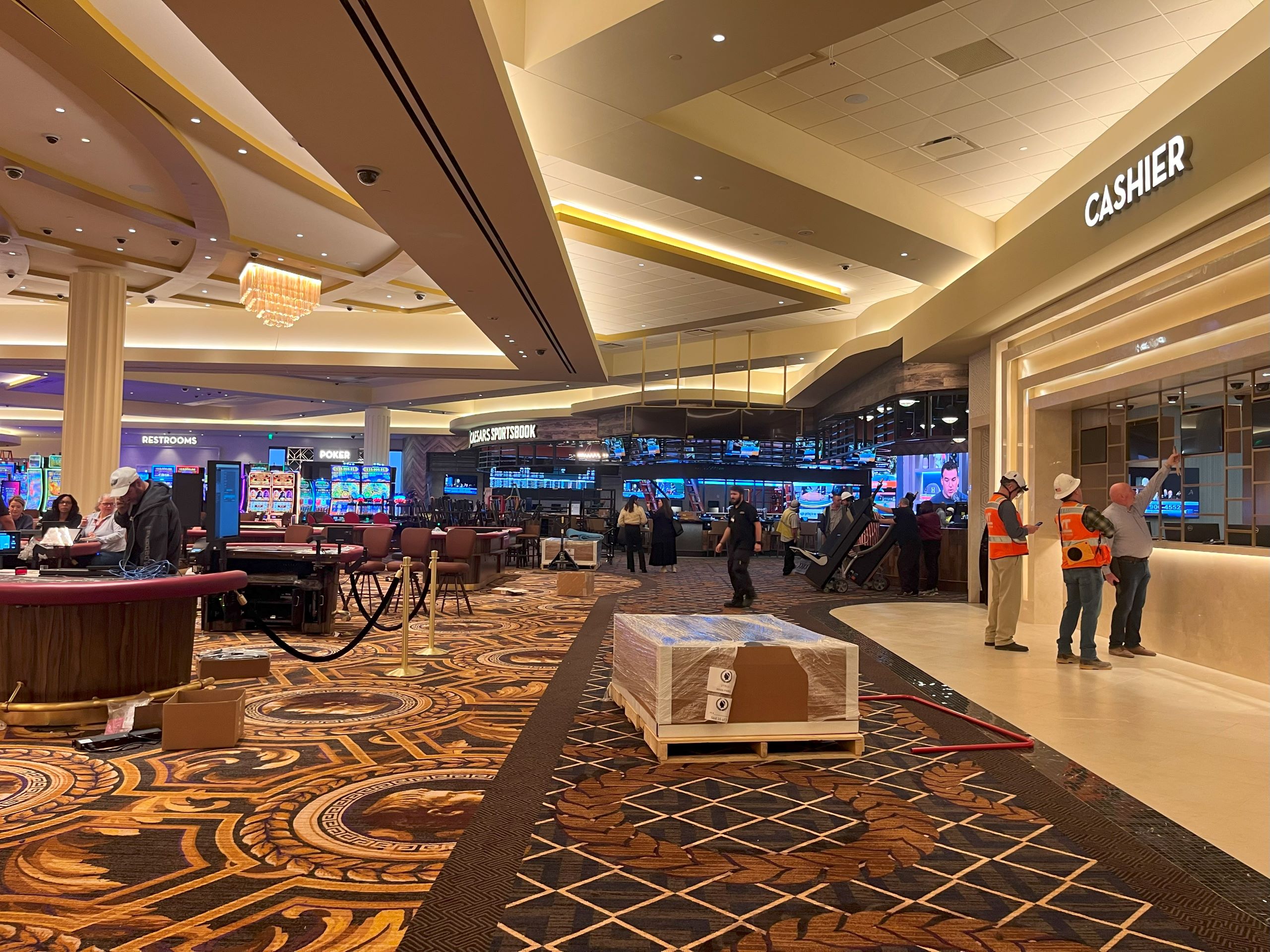 a cardboard box on the floor of the table games section of the casino resort.