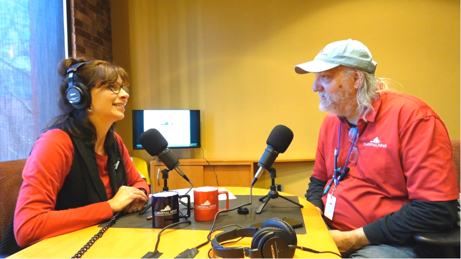 Dutchie and Dwayne talking during a podcast episode.