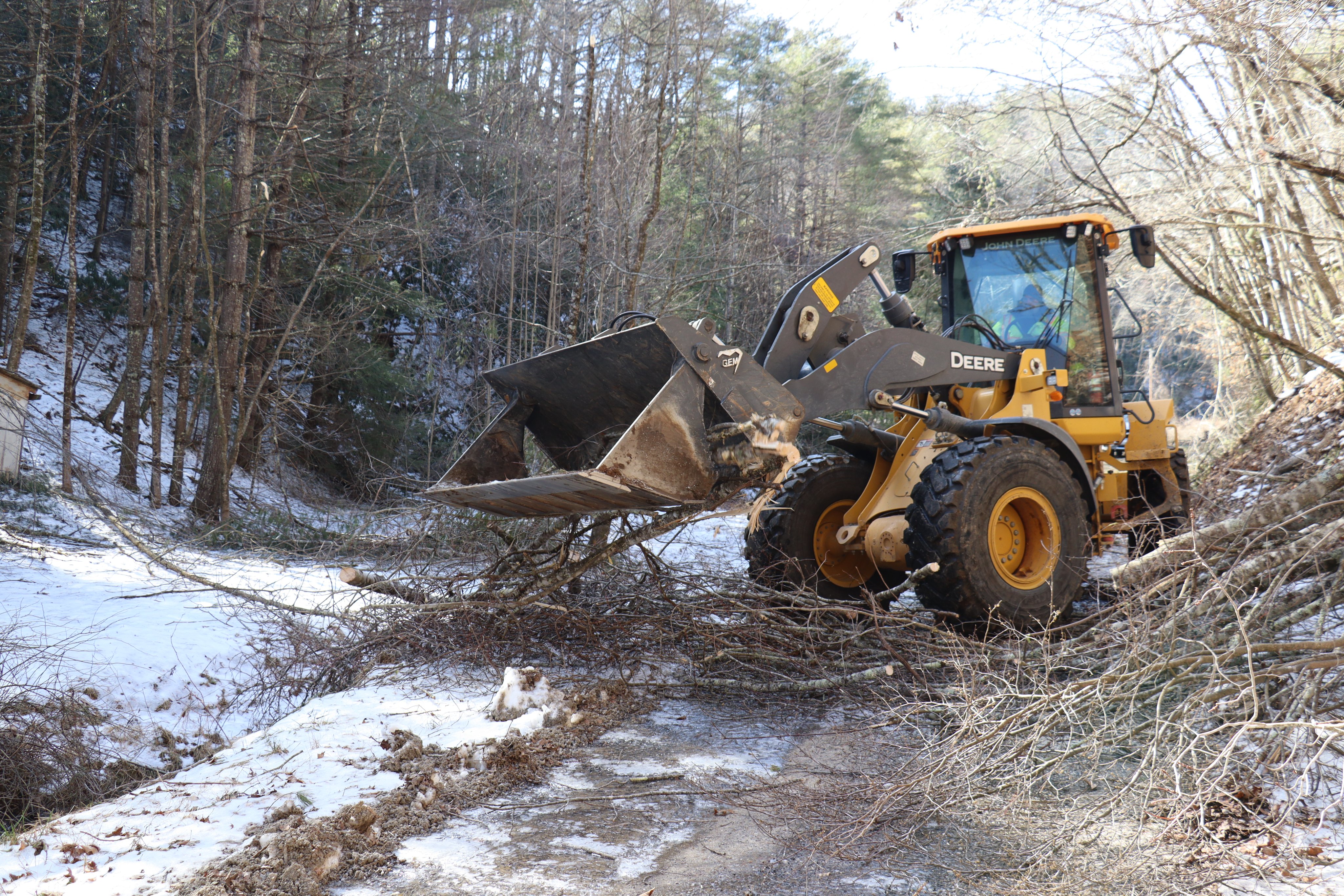Many roads are still in need of clearing after the midweek ice storm, such as this one near Check in Floyd County, even before Saturday's flooding rains and Sunday's gusty winds. Courtesy of VDOT.