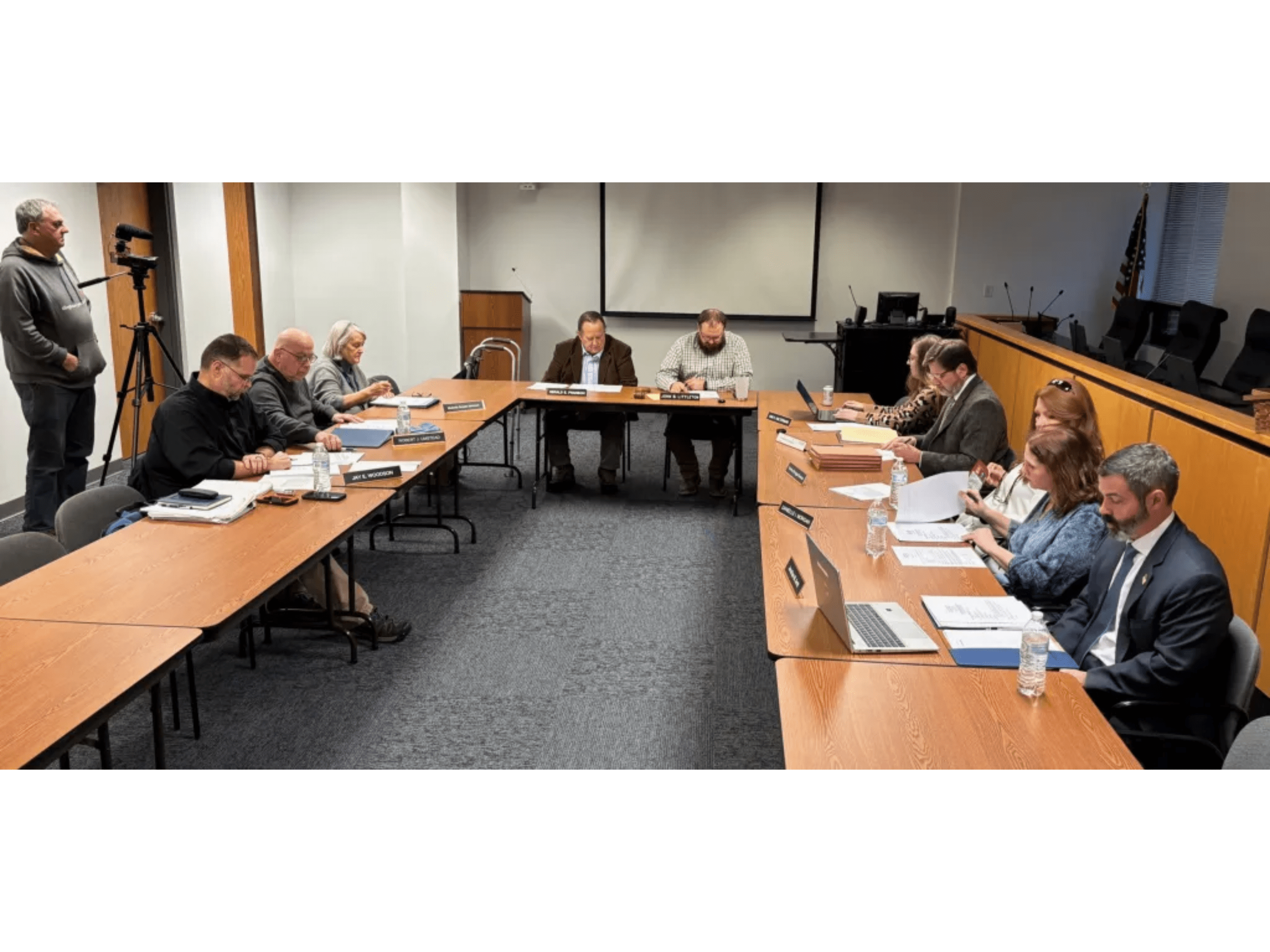 Board members meeting at a large conference table