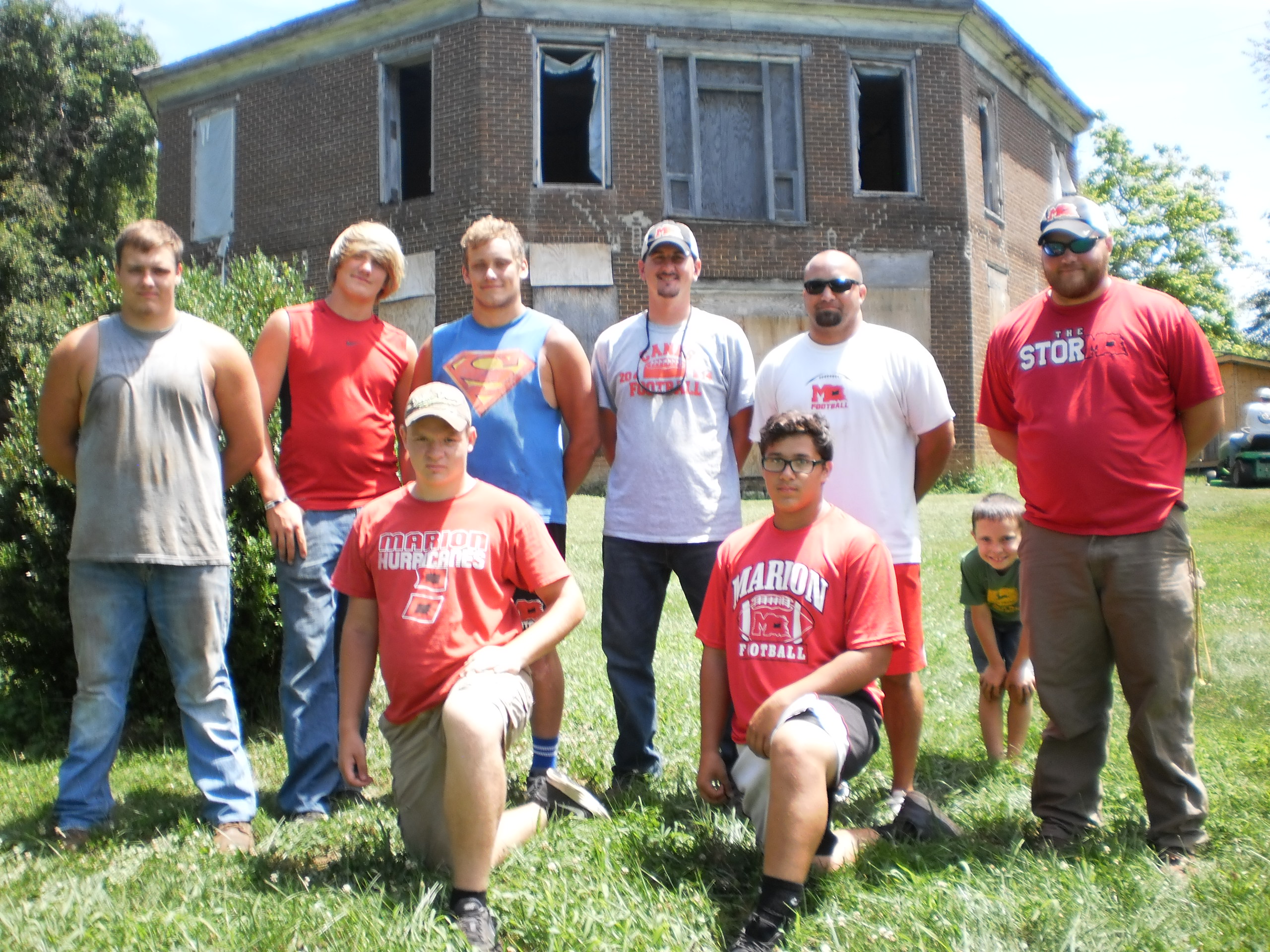 Marion Senior High School football players and coaches, volunteering for the day.