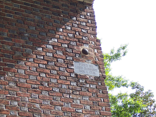 Cannonball lodged in the wall of St. Paul's Church in Norfolk. Photo by lori05871 from Rural Vermont, USA through Wikimedia Commons, licensed under the Creative Commons Attribution 2.0 Generic license.