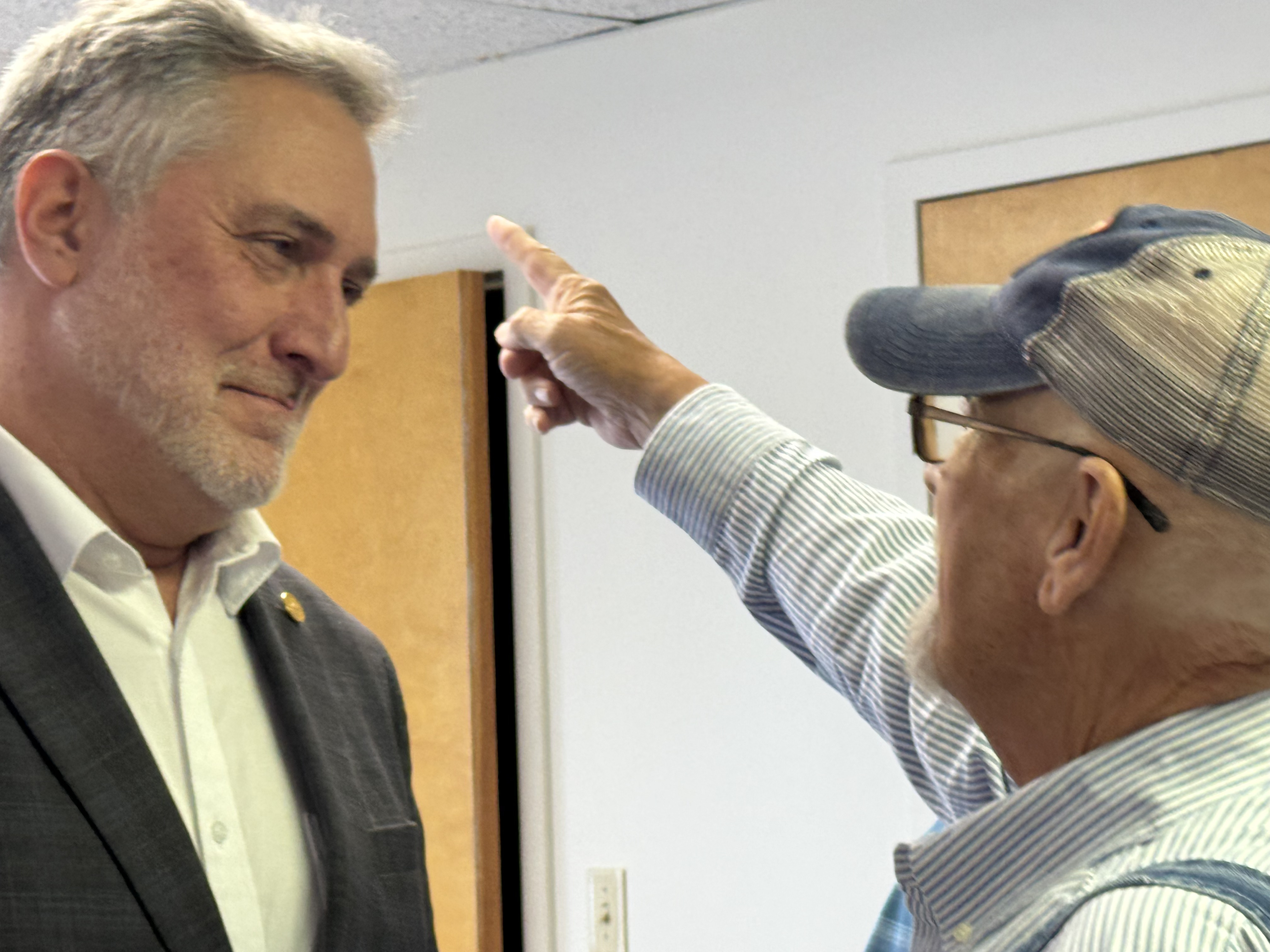 John Reid, left, with Washington County Supervisor C. Wayne Stevens. Photo by Senta Scarborough.
