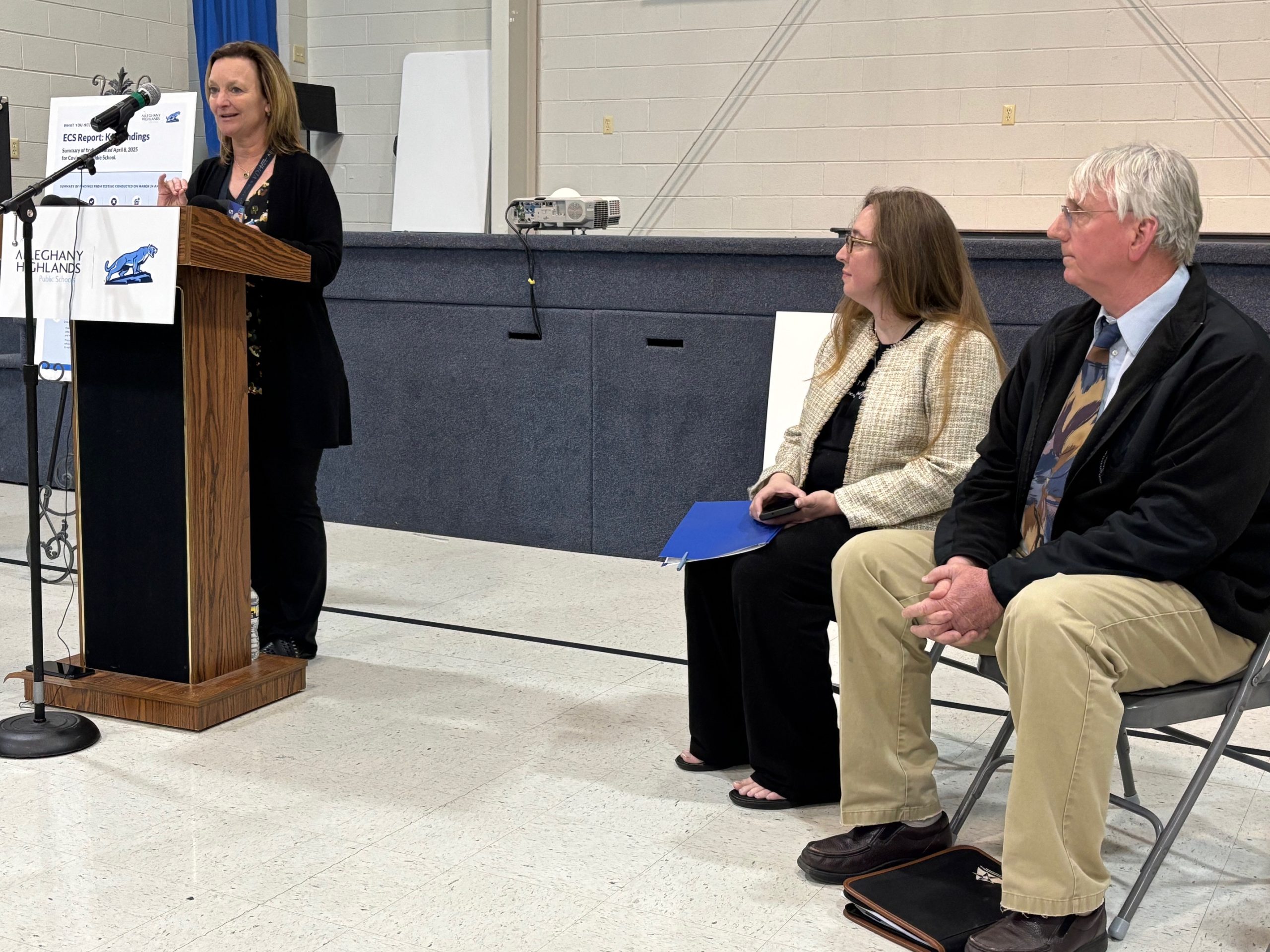 RCAHD Health Director Cynthia Morrow speaks during a press conference on Thursday at Covington's First Christian Church as Alleghany Highlands Public Schools superintendent Kim Halterman and Christopher Chapman of ECS Mid-Atlantic listen on Thursday, April 10, 2025. Photo by Steve Hemphill