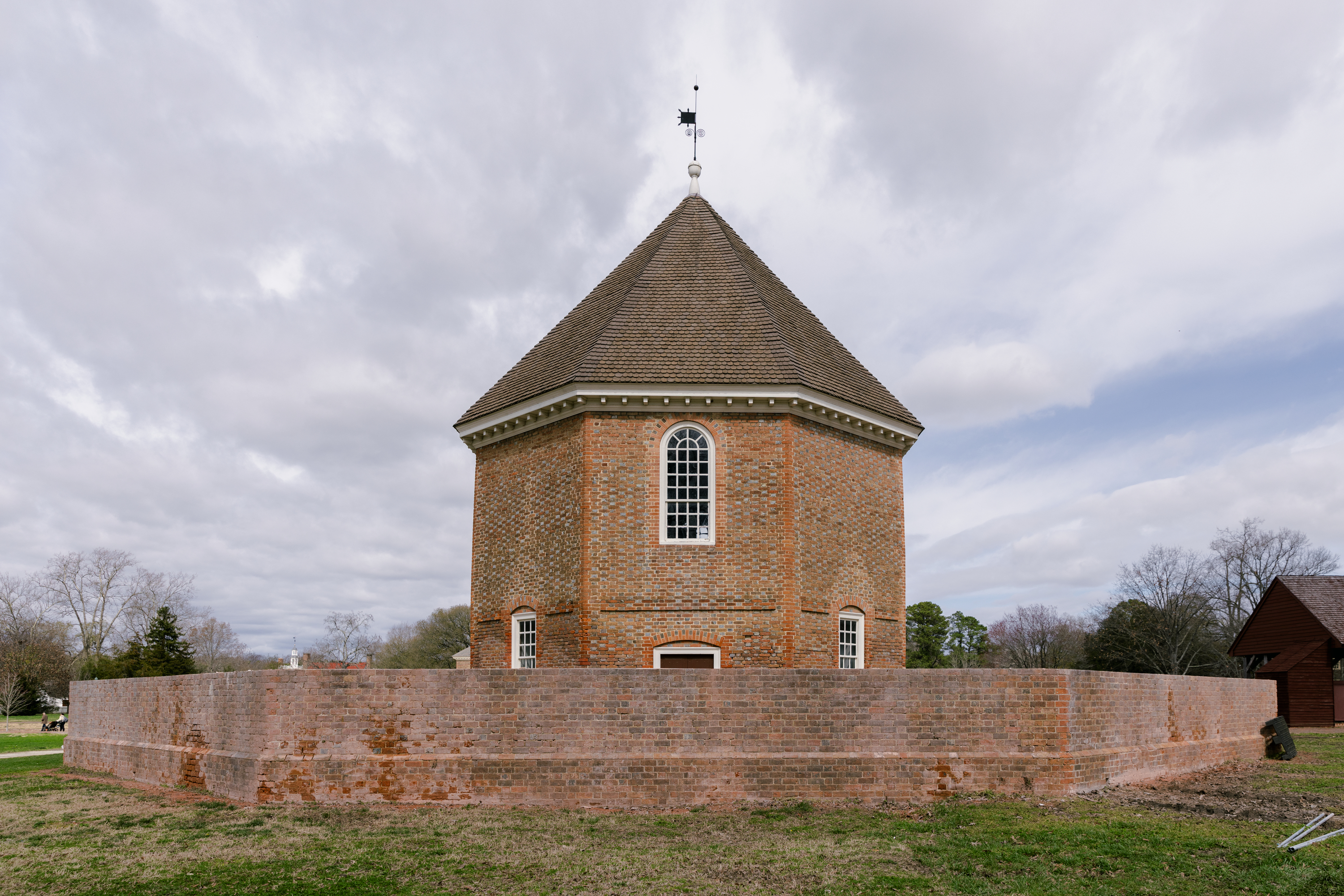 Rear of the Magazine showing construction progress on the lowering of the outer wall. March 8, 2024 Credit: Brendan Sostak, The Colonial Williamsburg Foundation