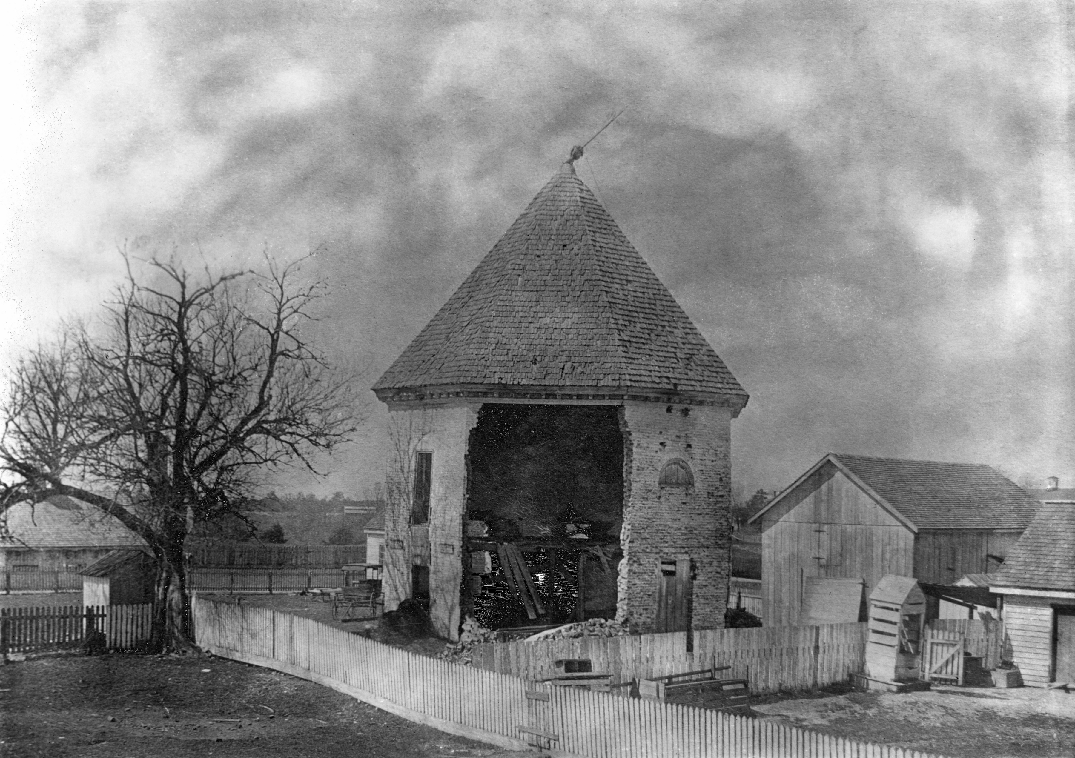 The Powder Magazine, when it was used as a stable: view of collapsed northeast wall, c. 1890 Credit: Clyde Holmes, The Colonial Williamsburg Foundation.