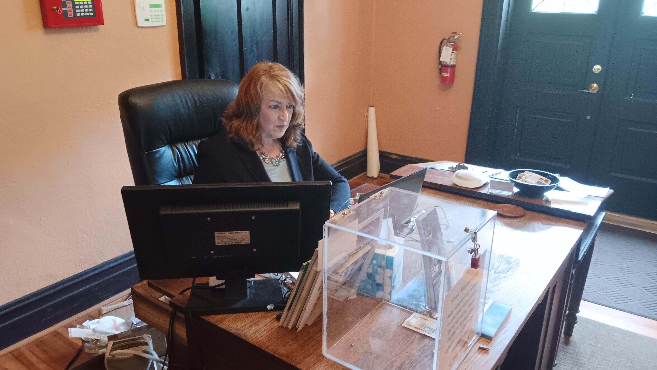 Holly Kozelsky at her workstation at the Martinsville-Henry County Historical Society