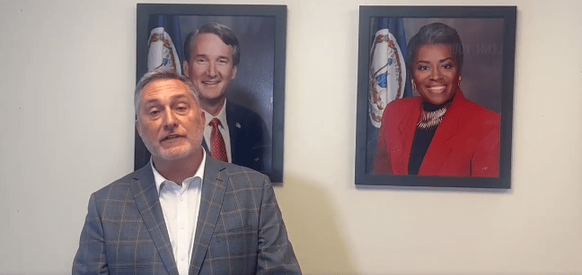 A screenshot from John Reid's video statement.