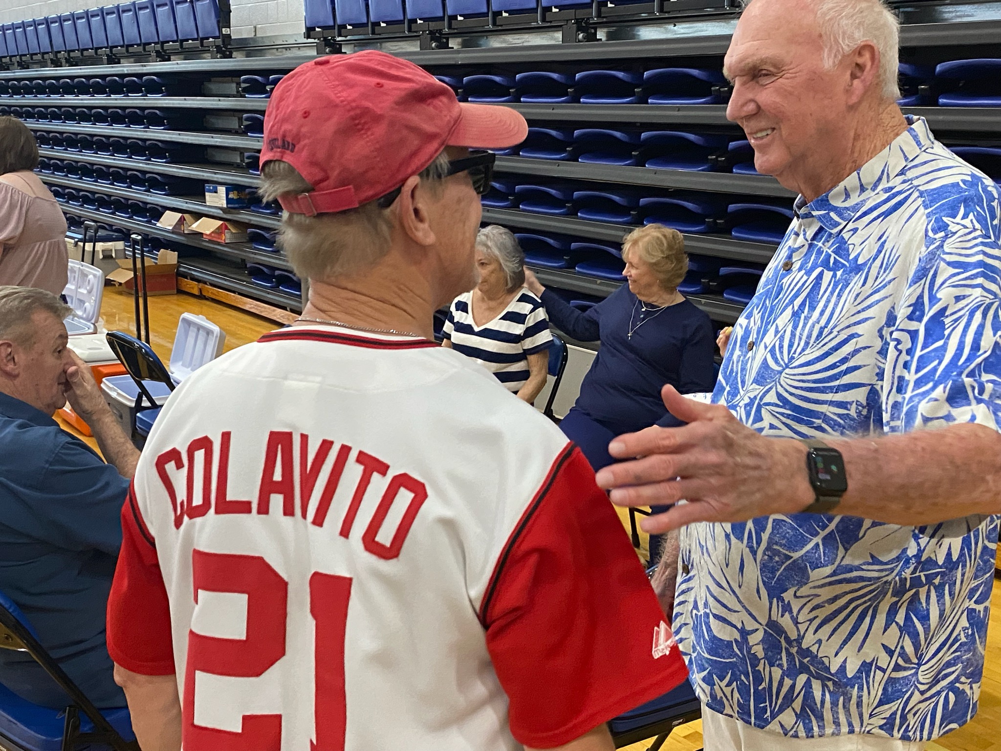 Charlie Manuel, right, speaks with a Cleveland baseball fan. Photo by Robert Anderson.