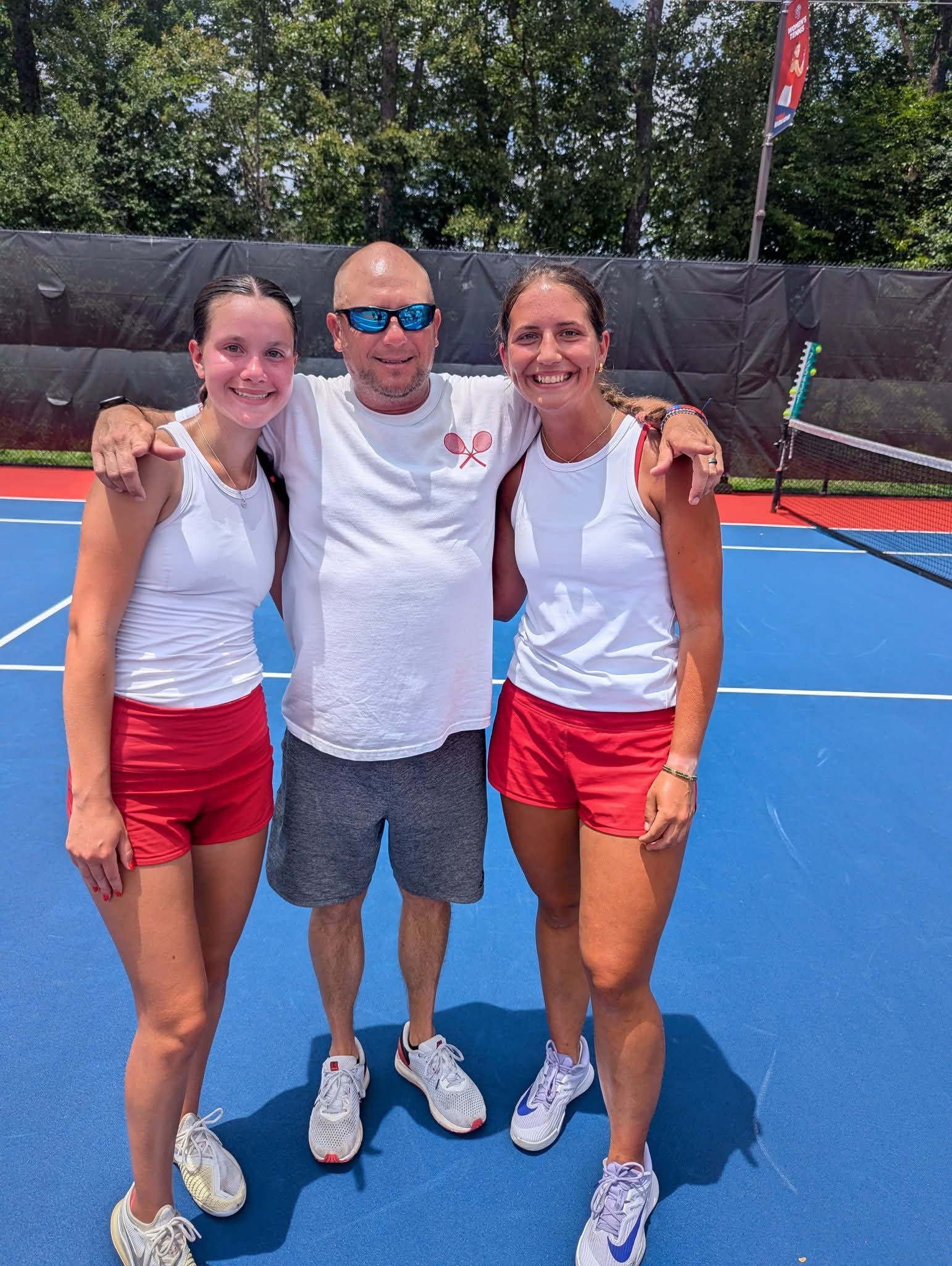 Ava Austin and Parker White with a coach. Courtesy of Marion Senior High School. 