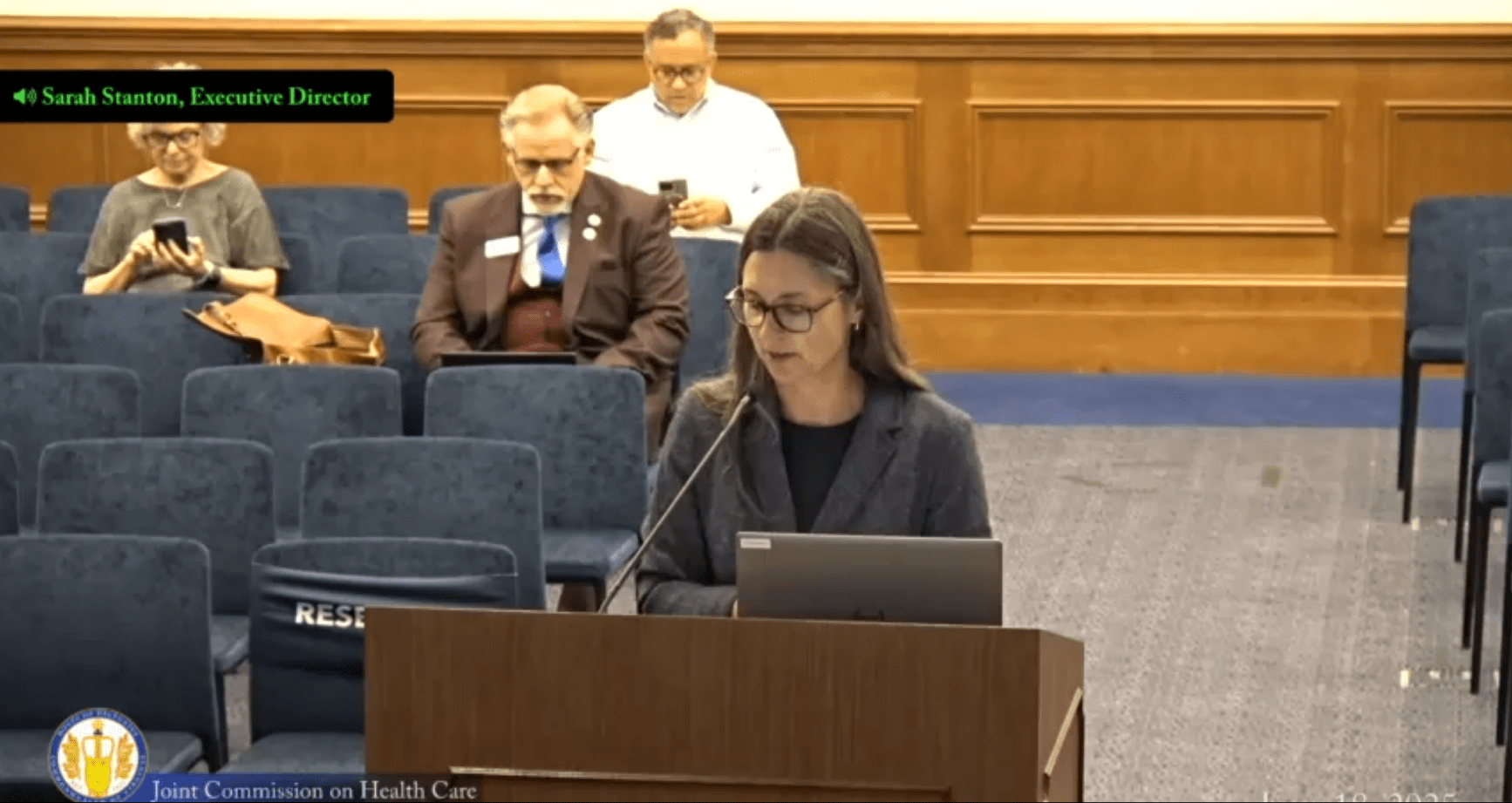 Sarah Stanton, executive director of the Joint Commission on Health Care, opens a presentation on preliminary findings from studies examining pharmacy deserts and transportation barriers across Virginia.