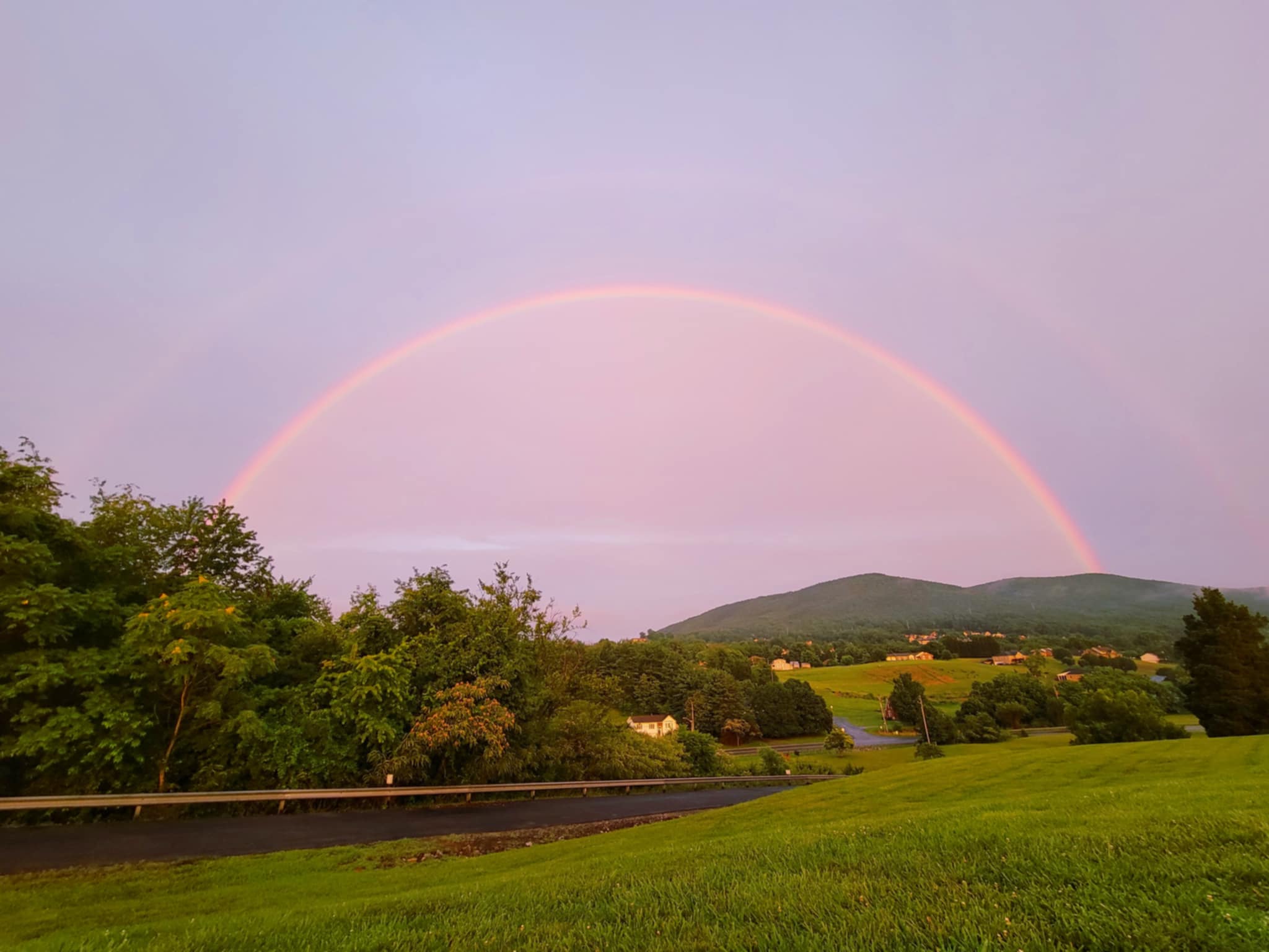 Daily rounds of showers and thunderstorms, interspersed with sunlight, have led to many rainbows being observed over Southwest and Southside Virginia in recent days, such as this on in Botetourt County on Sunday, July 6. Courtesy of Christine Saunders.