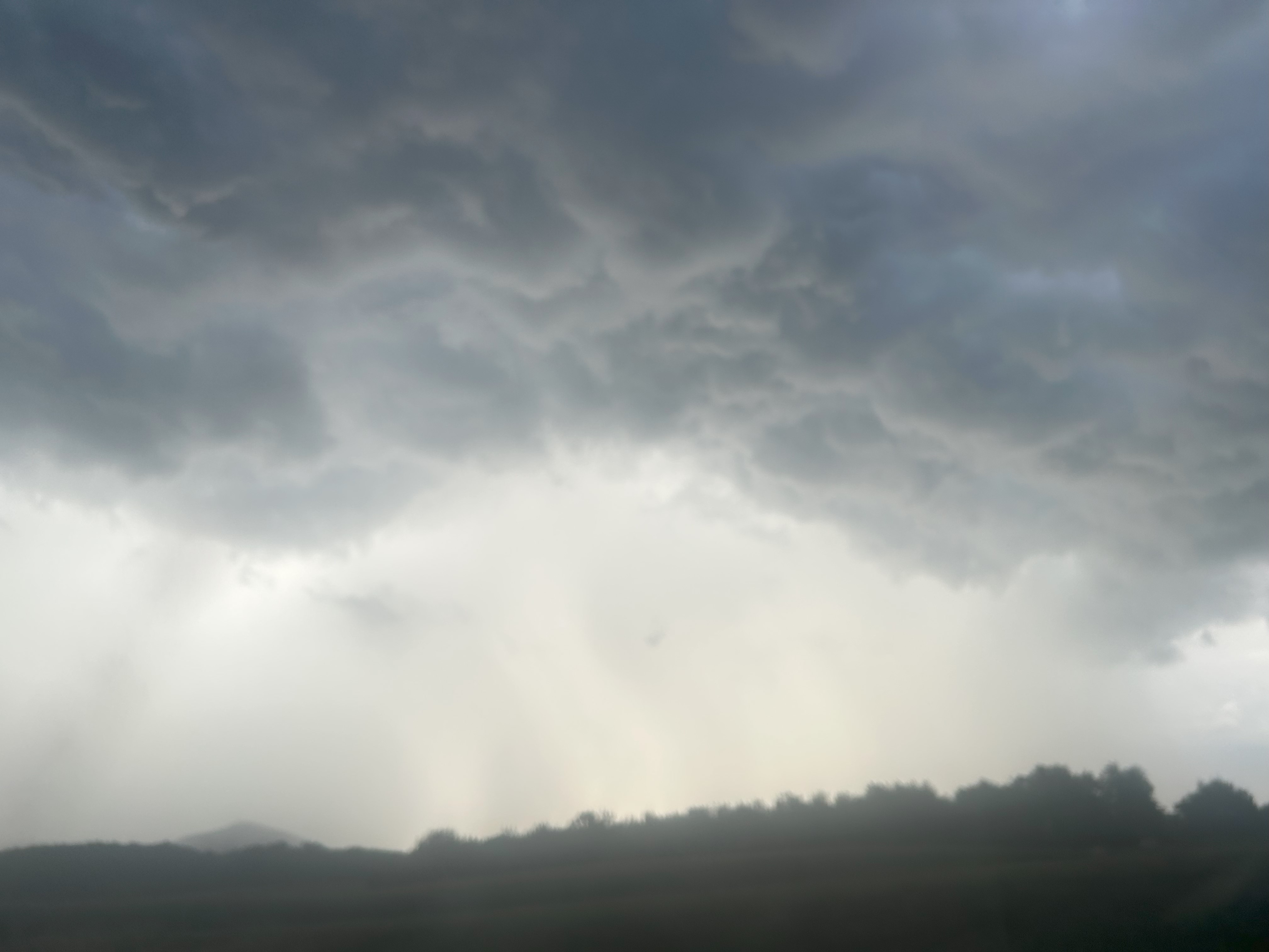 Angry outflow along a shelf cloud blows over Arcadia in Botetourt as a line of storms moves through late on Sunday, July 27. Photo by Kevin Myatt.