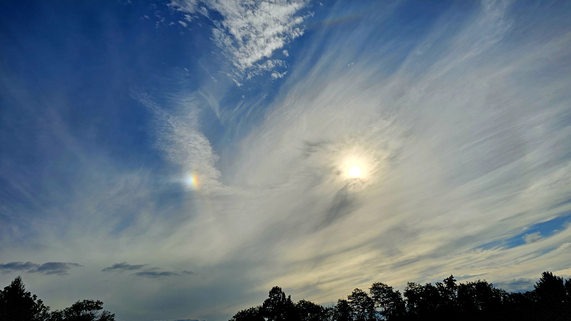 The sun was walking its dog -- a "sun dog," refracted sunlight in high-level ice crystal clouds -- on Monday evening, Aug. 4, over Blacksburg. Courtesy of National Weather Service.