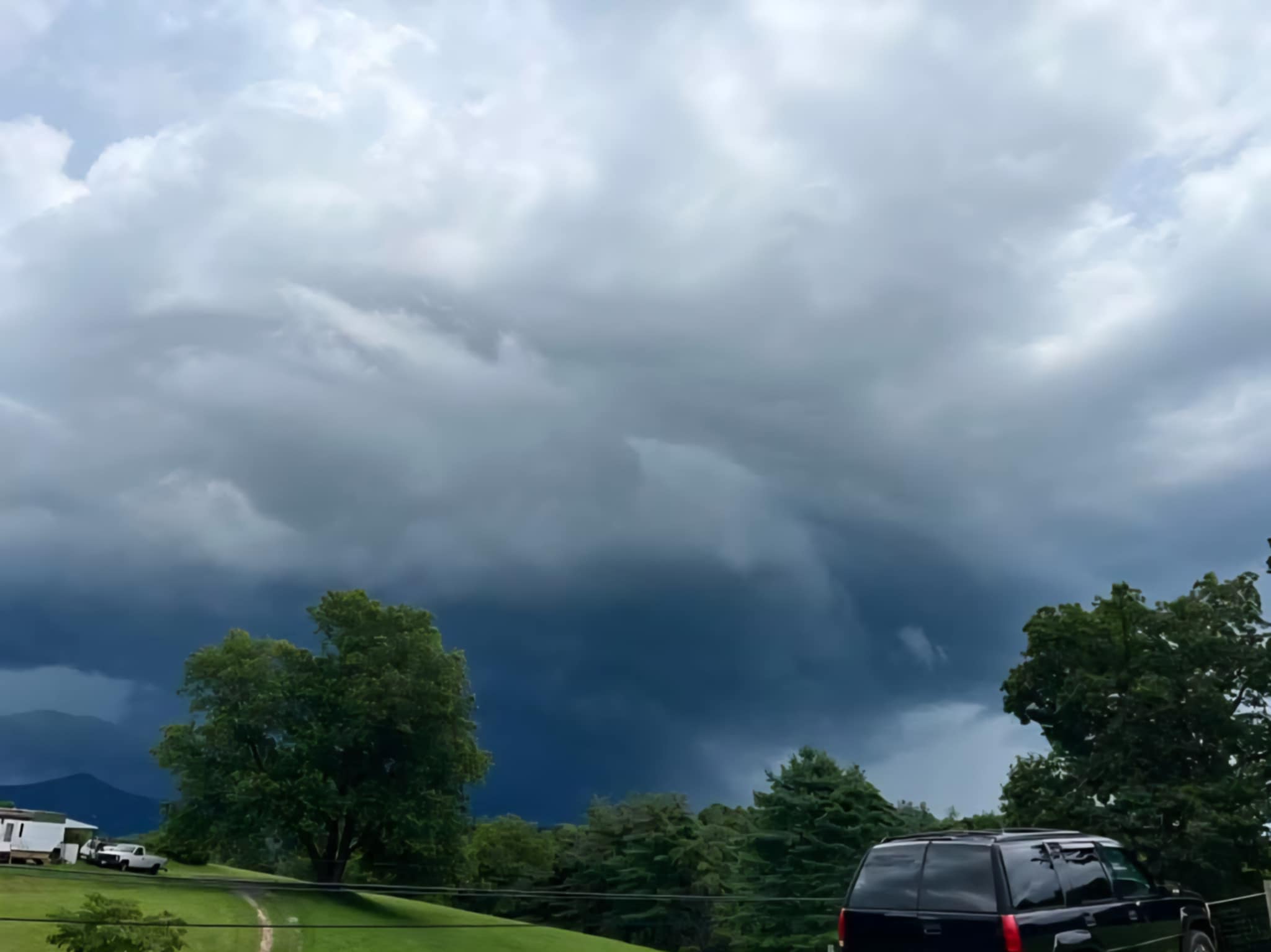 Dark clouds mark a strong thunderstorm over parts of the Roanoke Valley on Saturday, July 21. Hot temperatures are not on tap for a few more days in Southwest and Southside Virginia, but moisture will be beginning. Courtesy of Karen Conner.