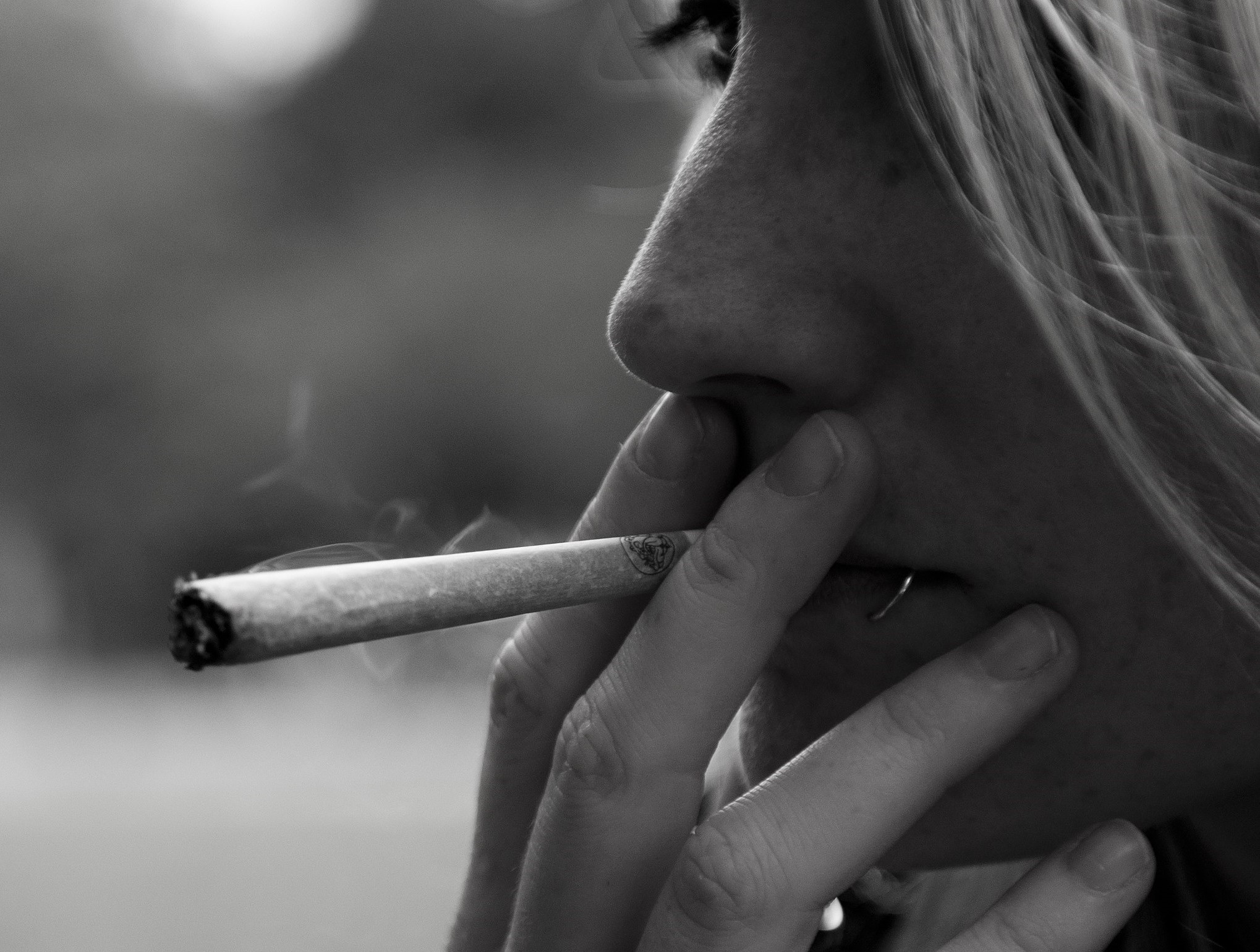 A woman in Amsterdam smoking a joint. Courtesy of Ashton Doyle.