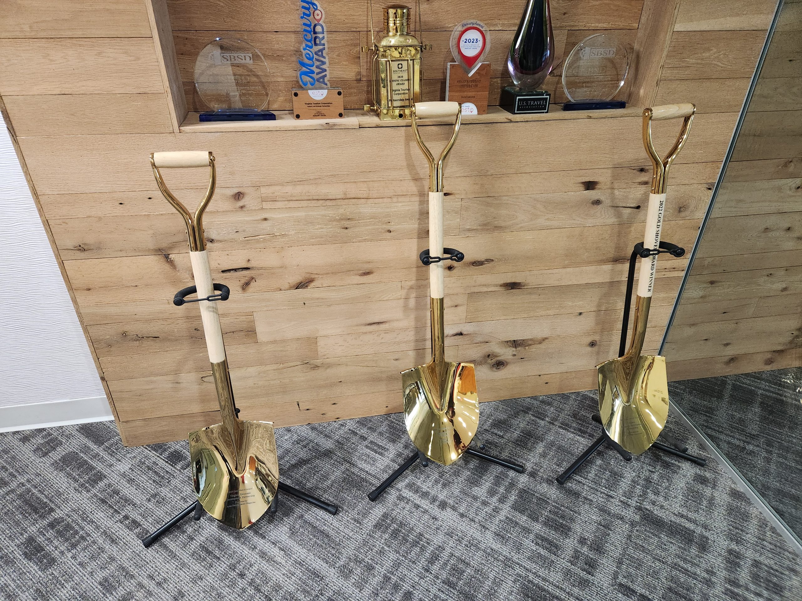 Ceremonial golden shovels in the lobby of the Virginia Economic Development Partnership office in Richmond. Photo by Dwayne Yancey.
