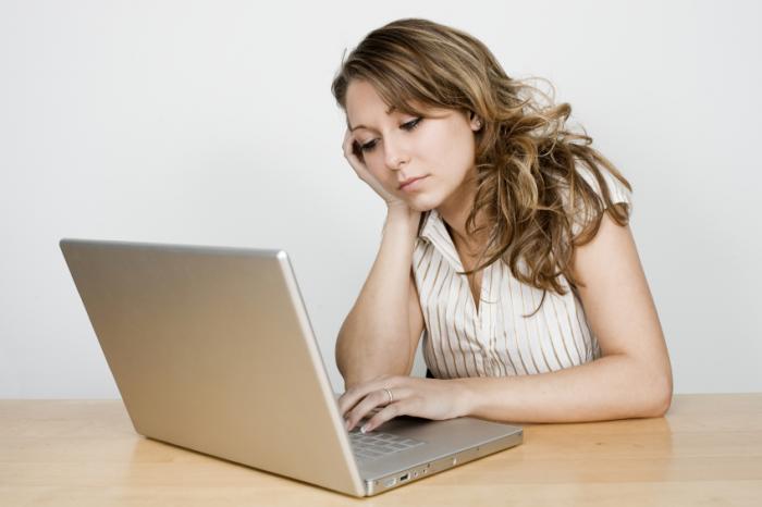 young woman using laptop