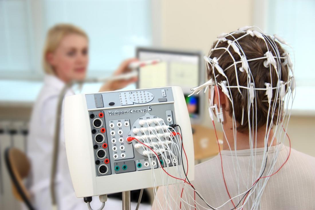 An electroencephalogram, or EEG being performed. Image credit: Baburov, 2009.