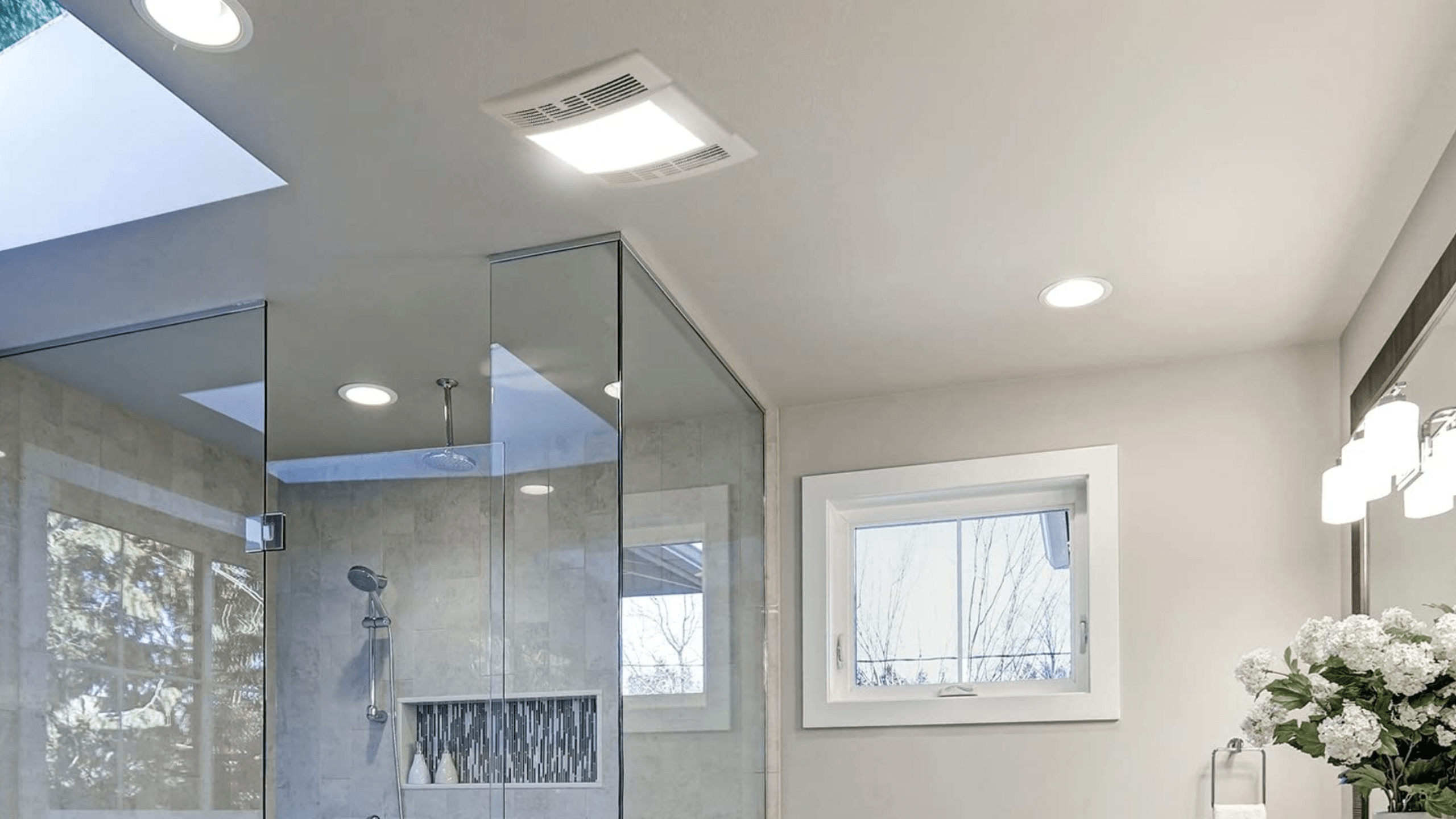 A bathroom exhaust fan with light
