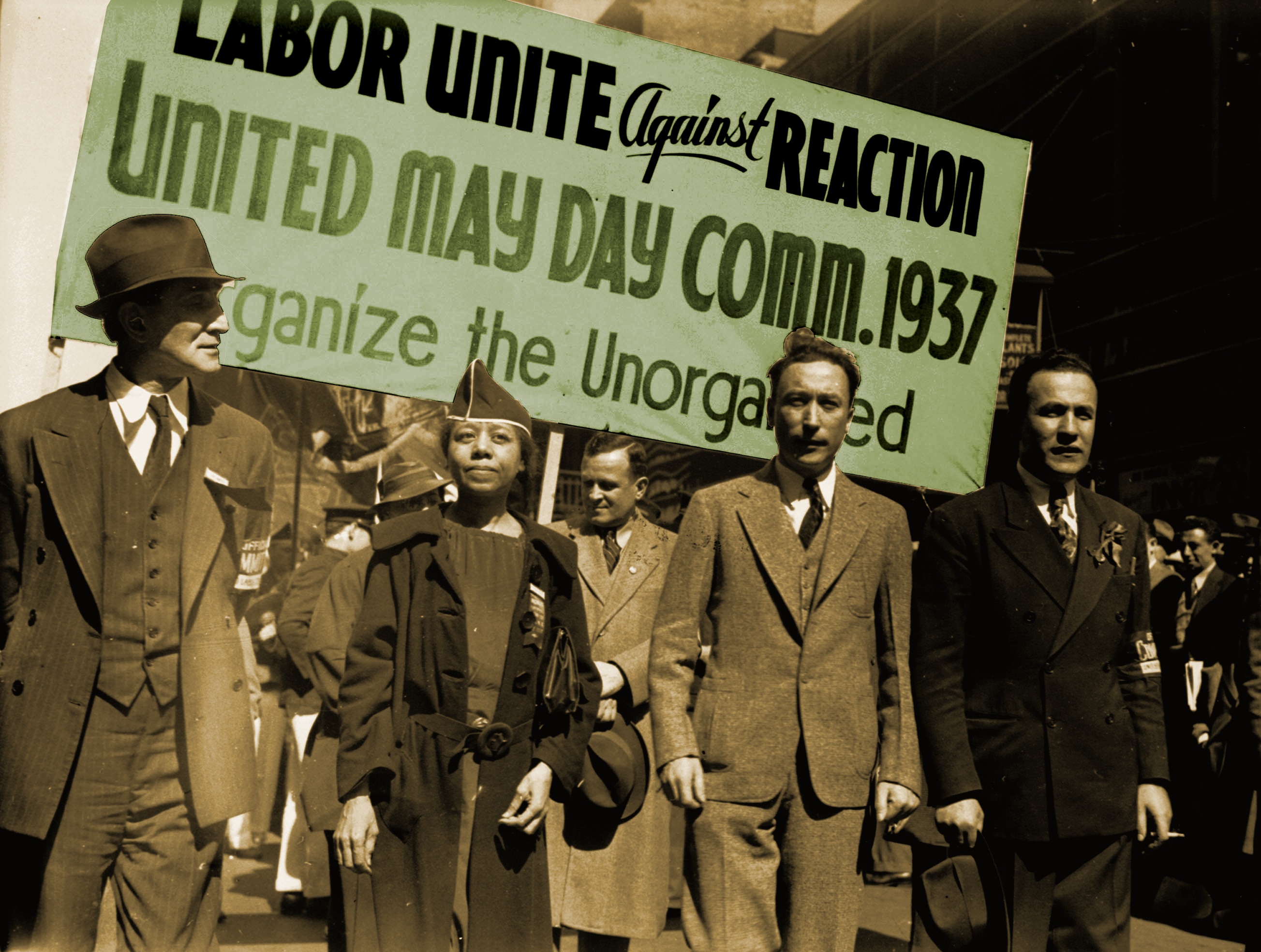 Edith Ransom and Charles Zimmerman (center) of ILGWU Local 22 march with others in the 1937 May Day parade.