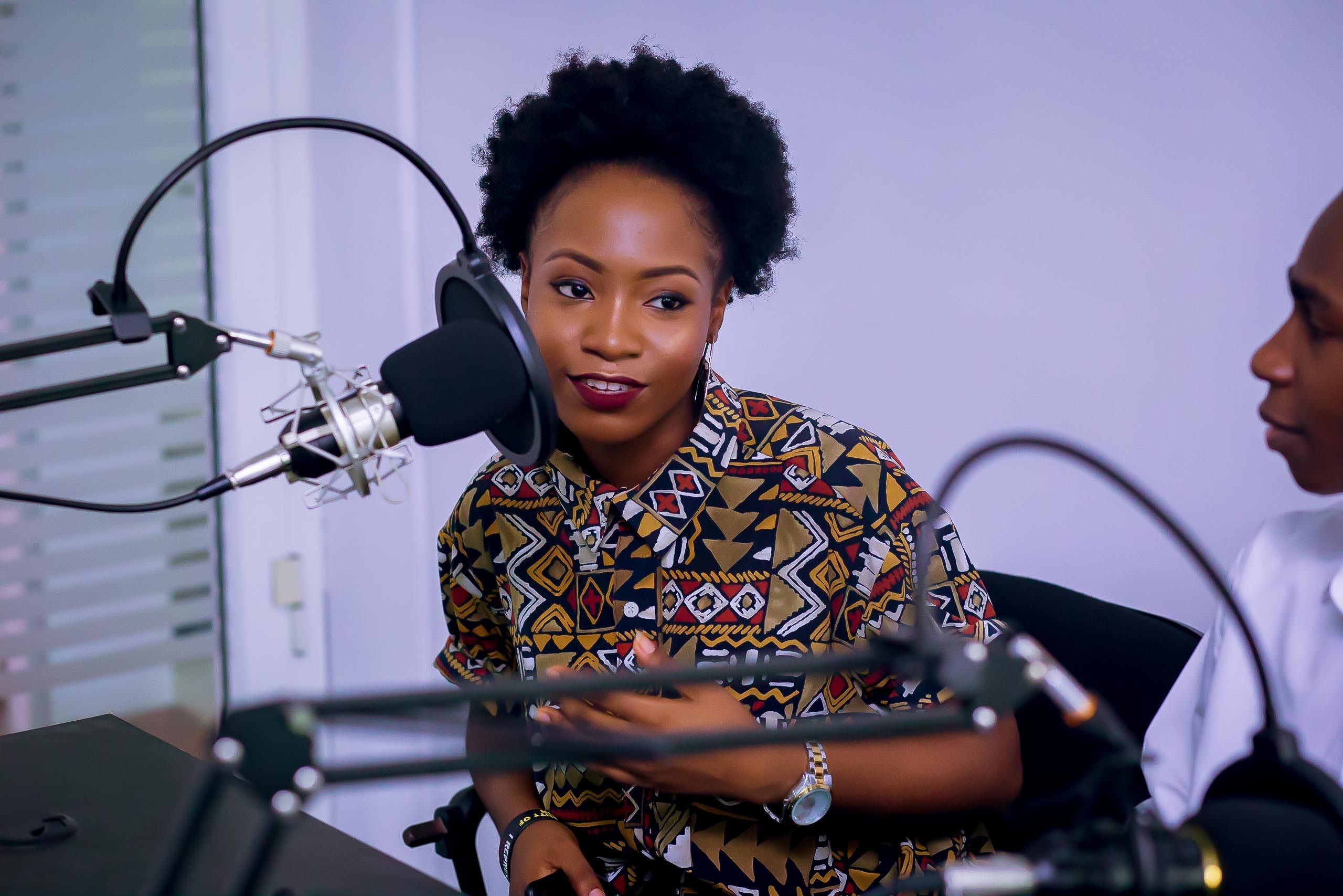 woman in a podcast studio