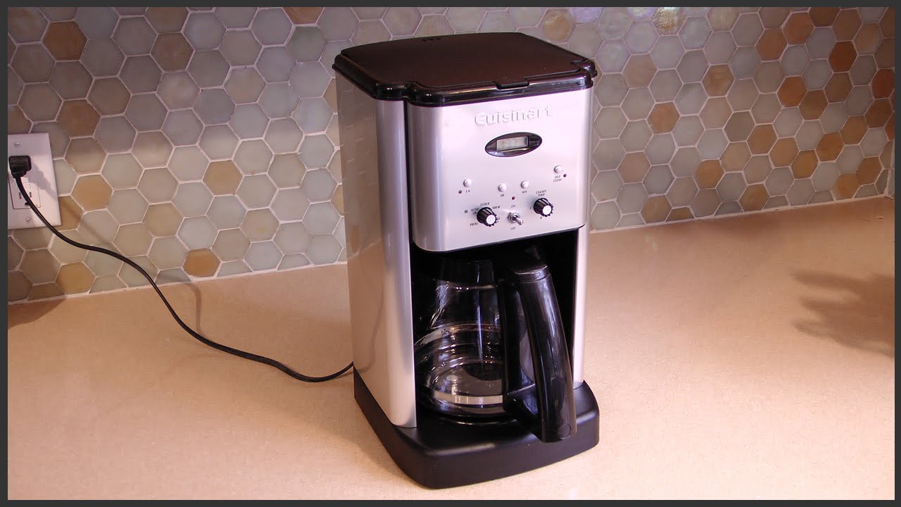 What does the clean button do on a coffee maker