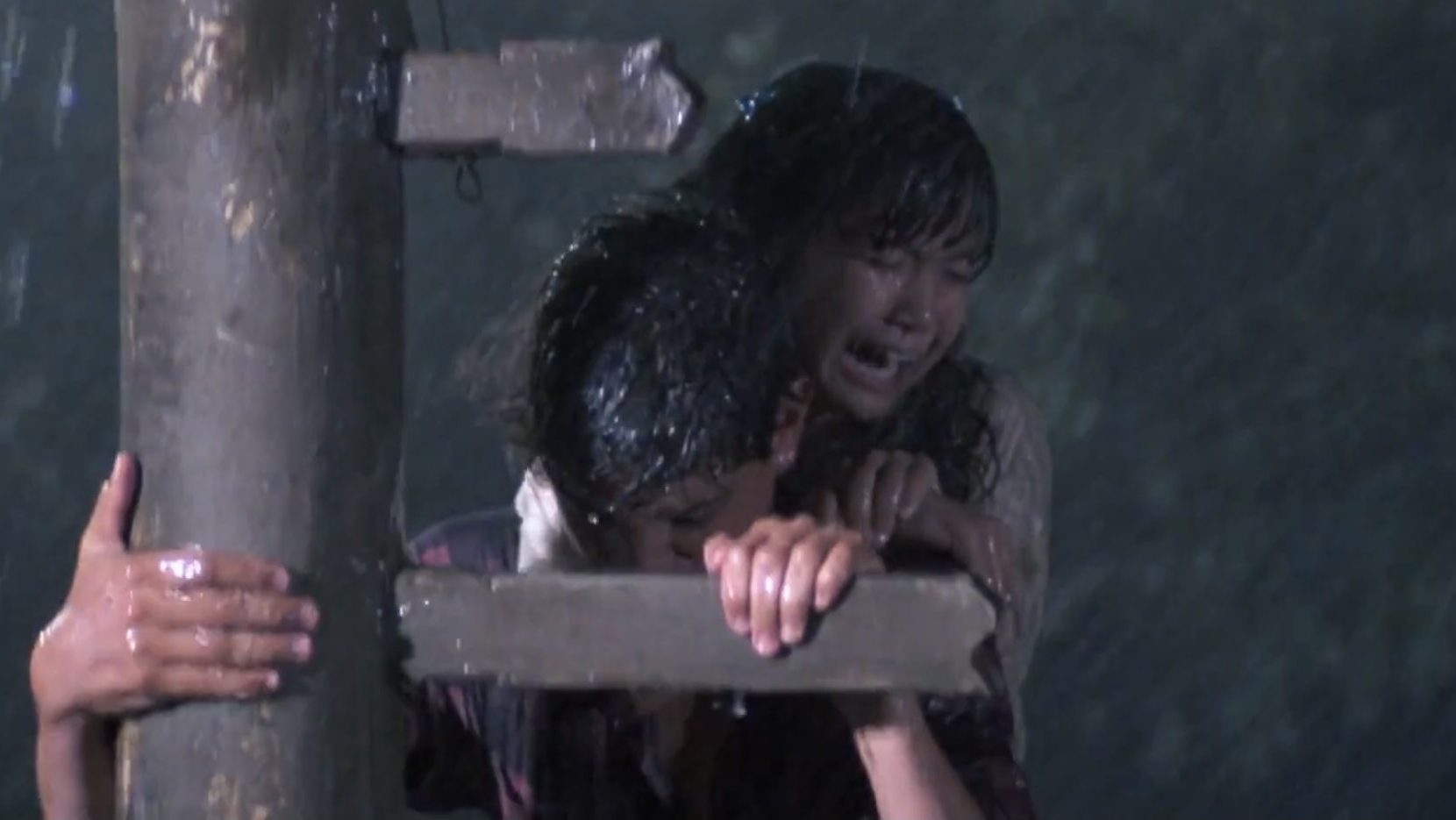 Daniel (Ralph Macchio) rescues Yuna (Traci Toguchi) in 'The Karate Kid Part II.'