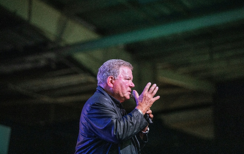 William Shatner speaks from the stage at the second edition of the multi-genre entertainment comic and fan convention 'Comic Con Africa' in Johannesburg on September 21, 2019