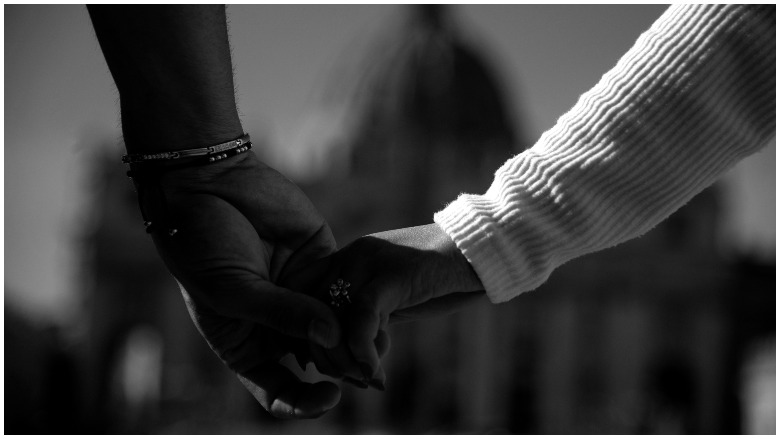 A couple holding hands