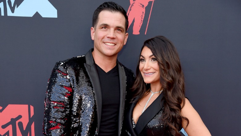 Chris Buckner and Deena Nicole on the red carpet.