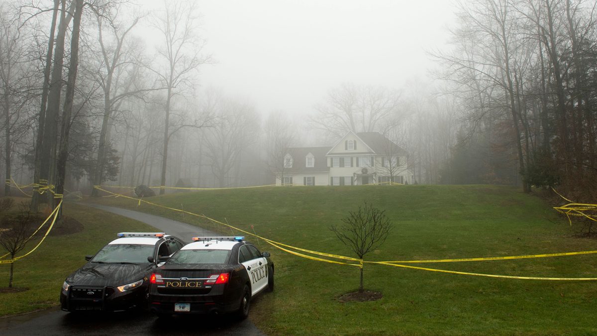 Police in front of a home