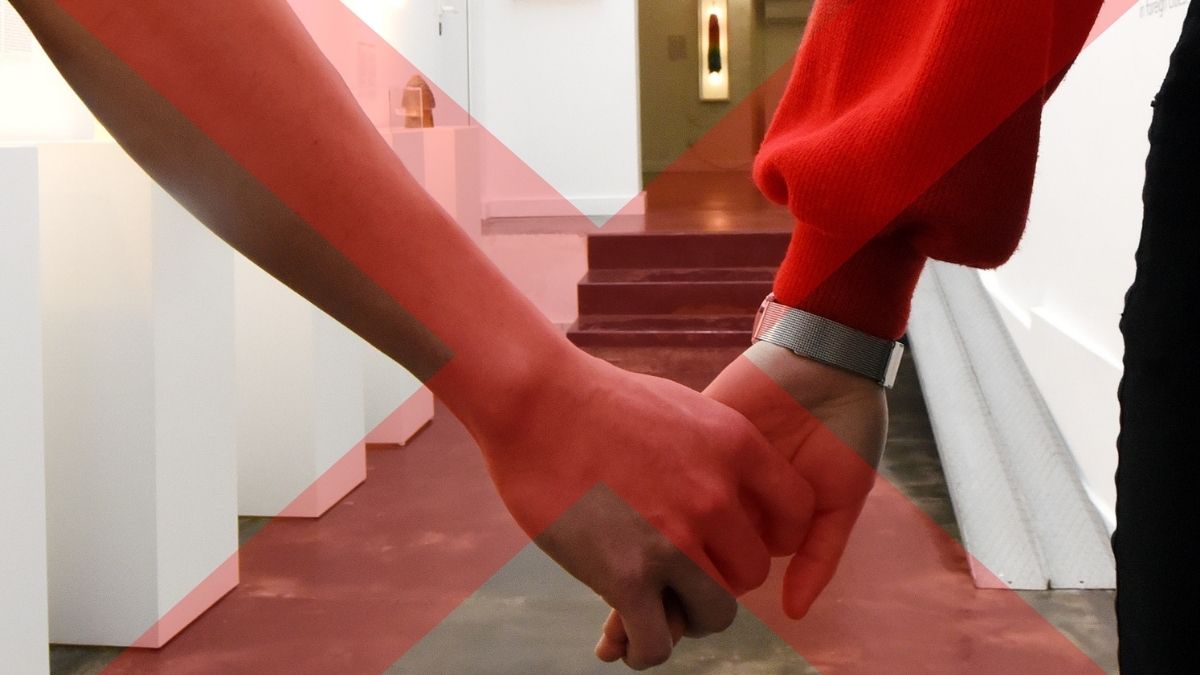 Couple holding hands