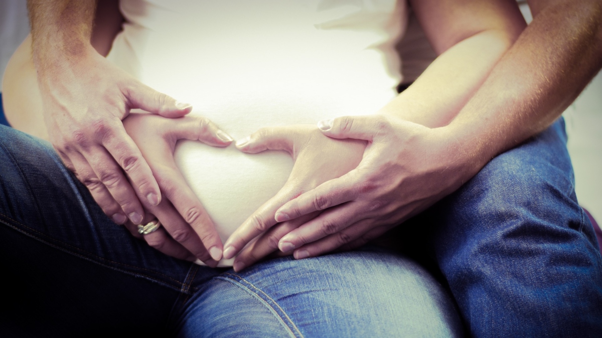 Man and woman pregnancy reveal
