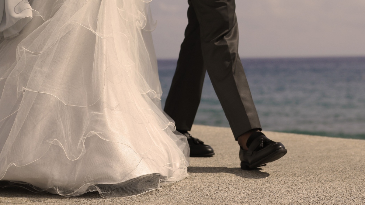 Bride and groom ocean