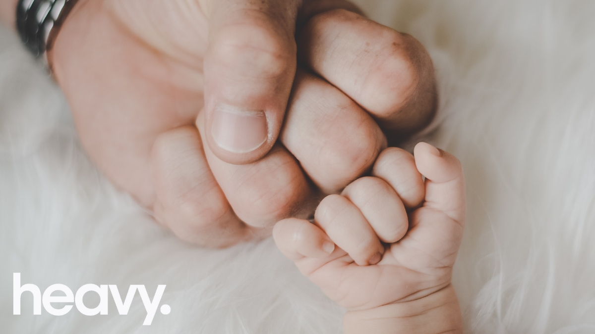 Daddy and baby's hands