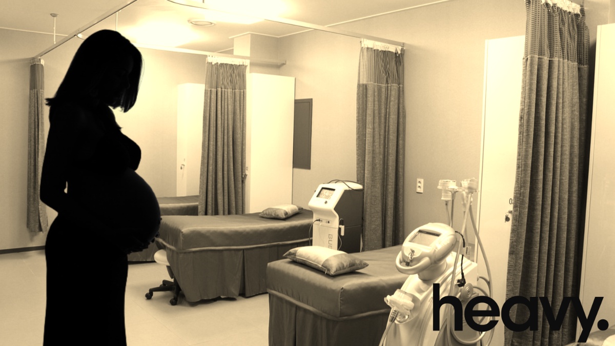 A pregnant woman.