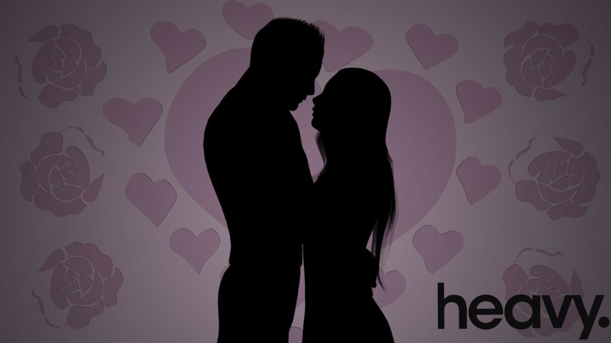 A couple almost kissing.