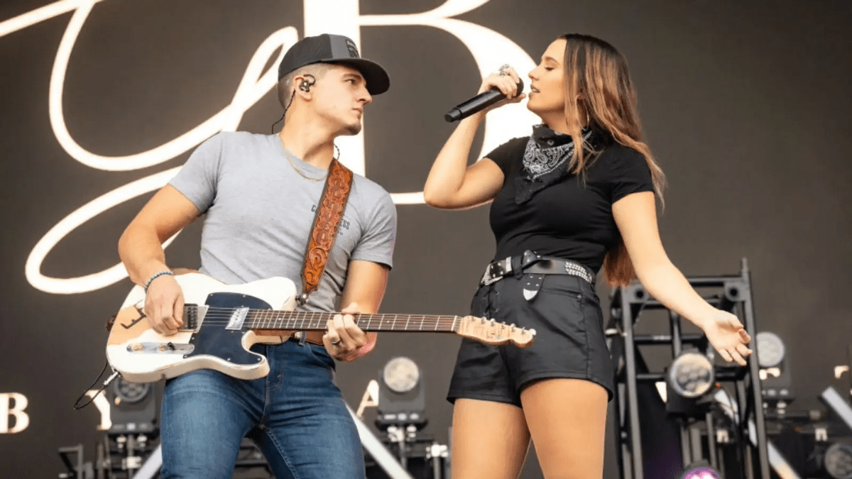 Gabby Barrett and Cade Foehner perform on stage.